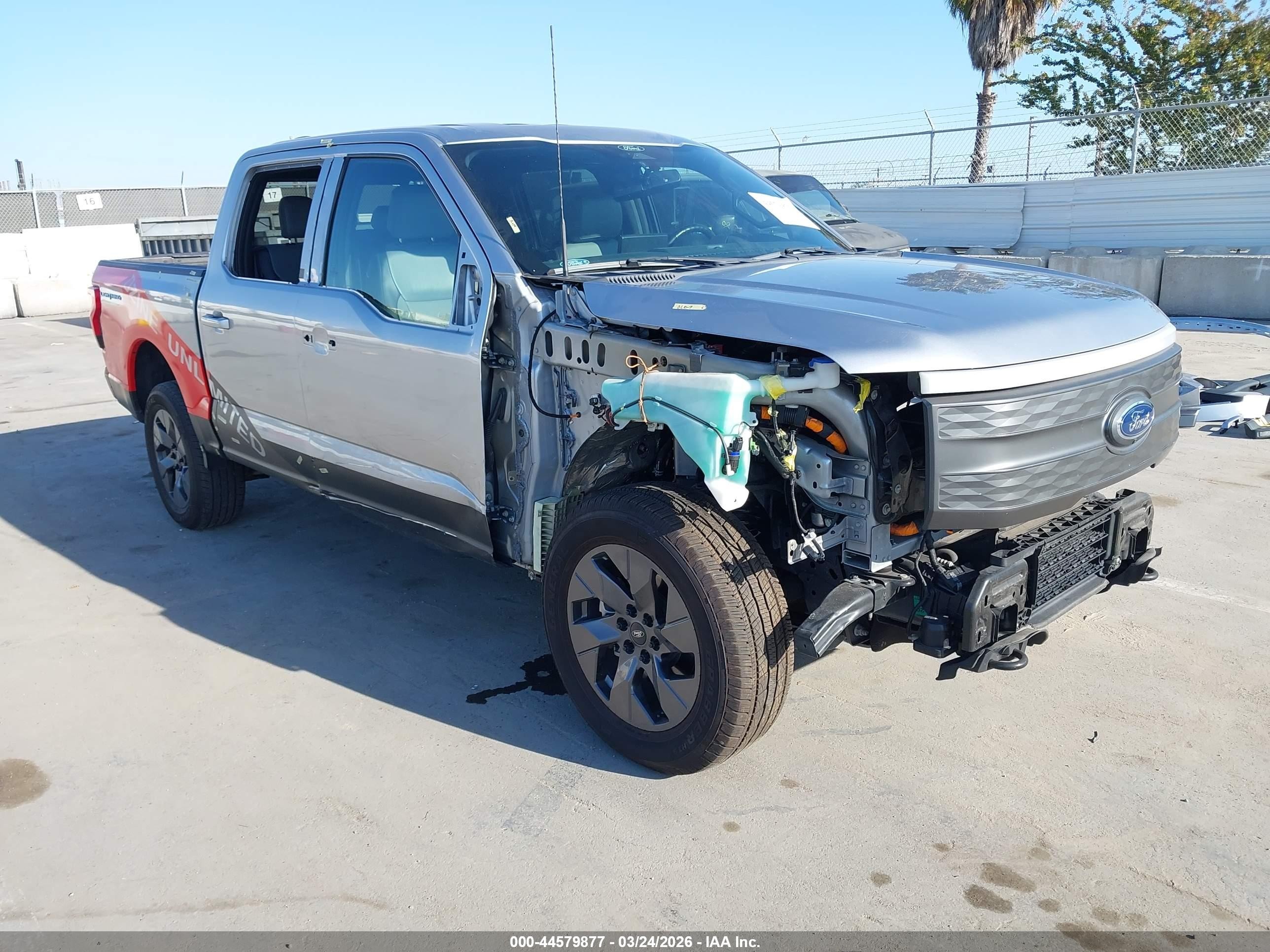 2022 Ford F-150 Lightning XLT, VIN 1FTVW1EL0NWG14449 — Front end