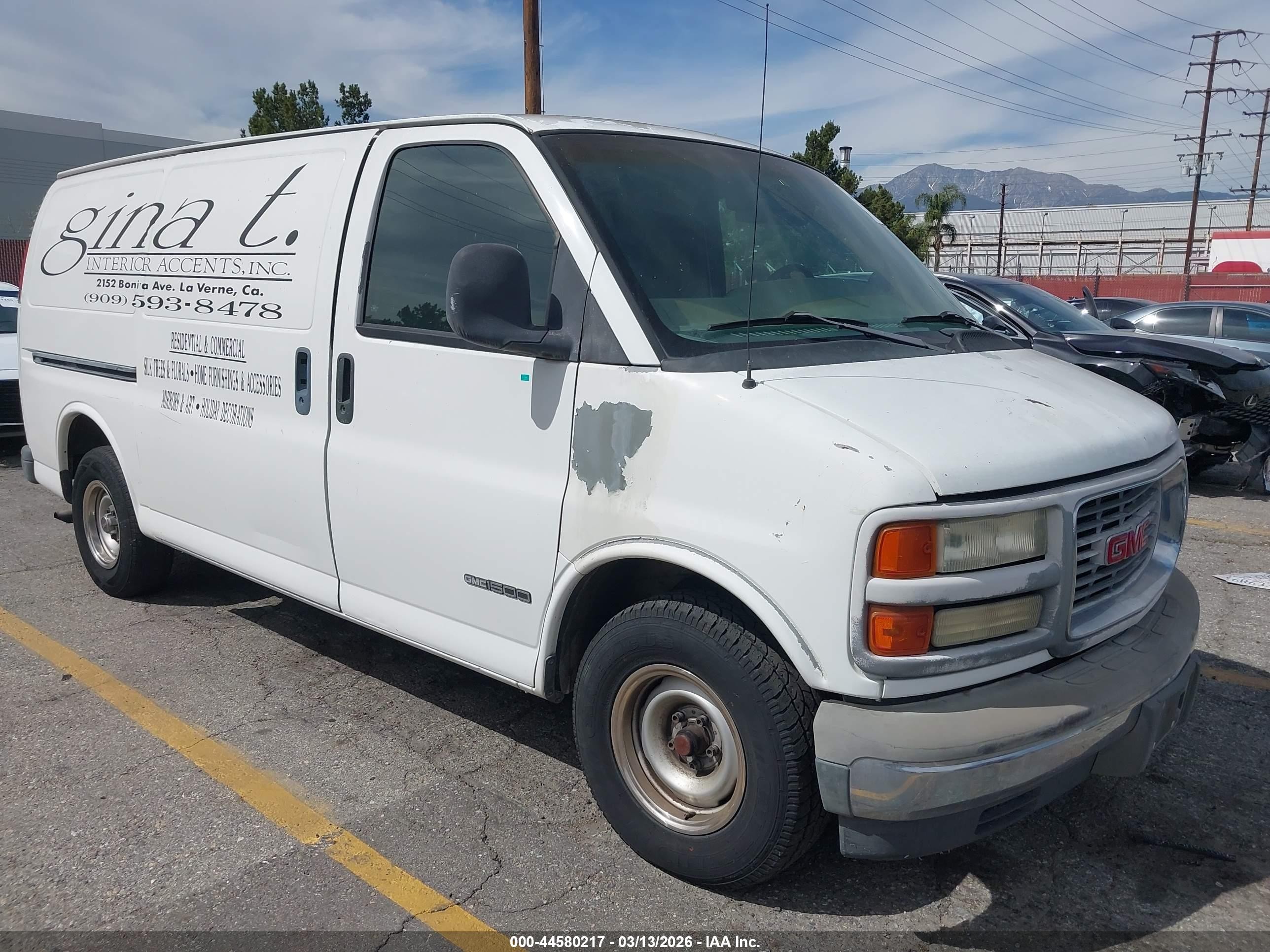 1997 GMC Savana, VIN 1GTEG15M1V1002134 — Side