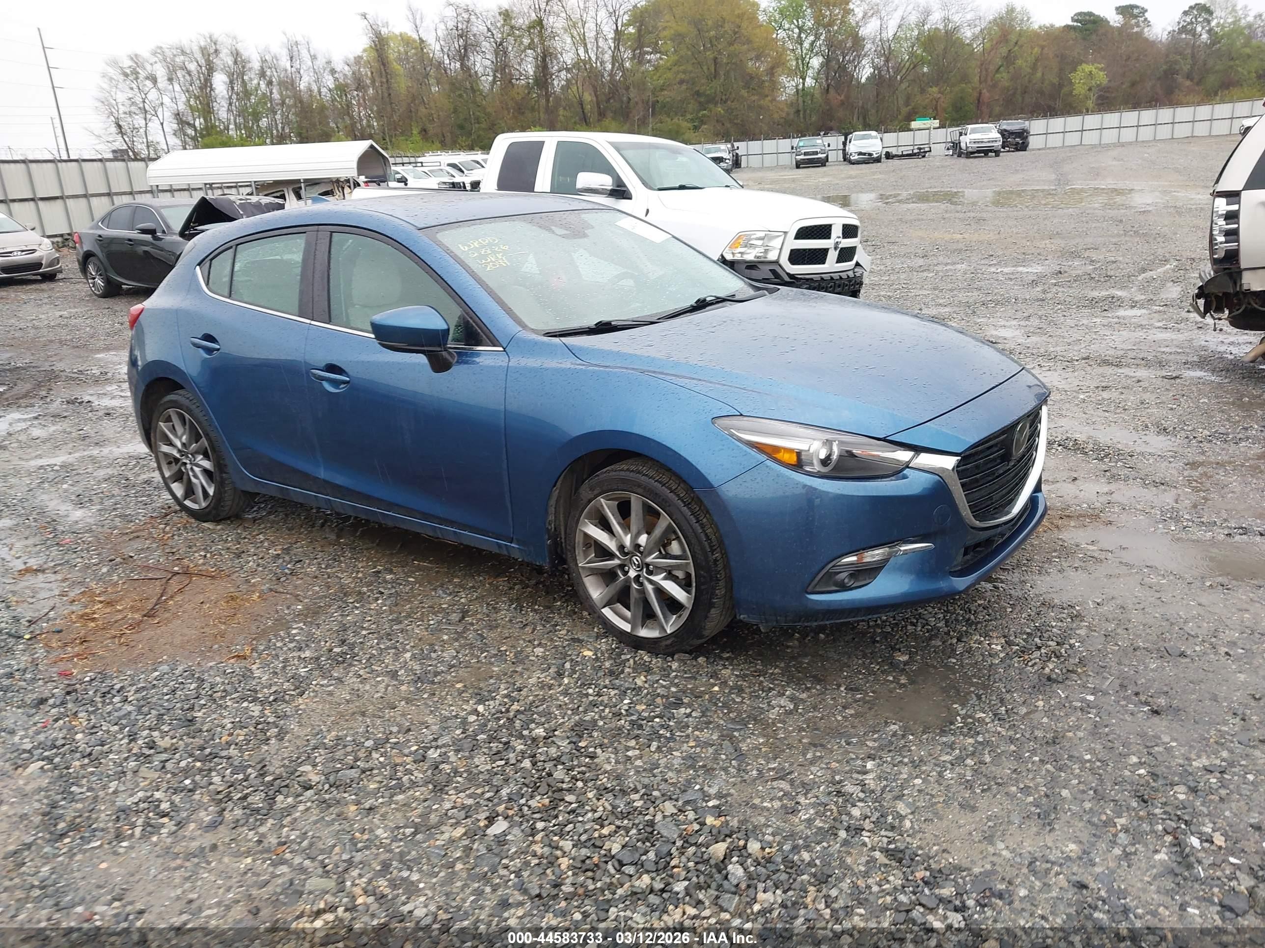 2018 Mazda 3 Grand Touring, VIN 3MZBN1M39JM202044 — Side