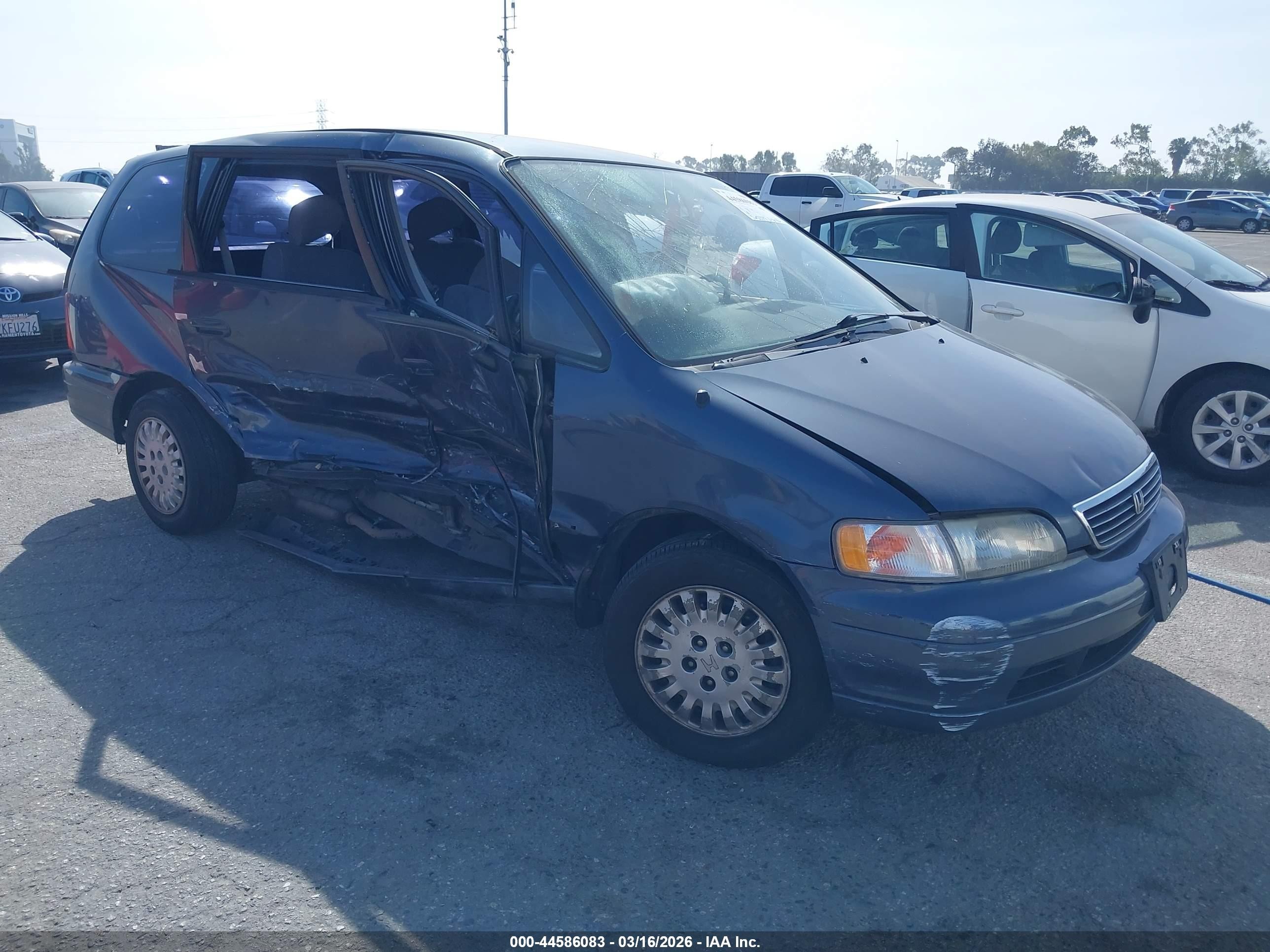 1995 Honda Odyssey LX, VIN JHMRA1848SC028842 — Side