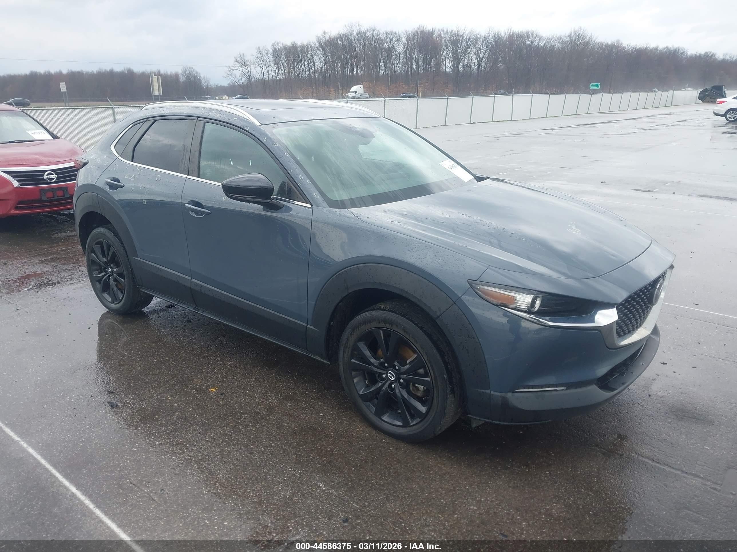 2022 Mazda CX-30 S Carbon Edition, VIN 3MVDMBCL1NM457457 — Hail