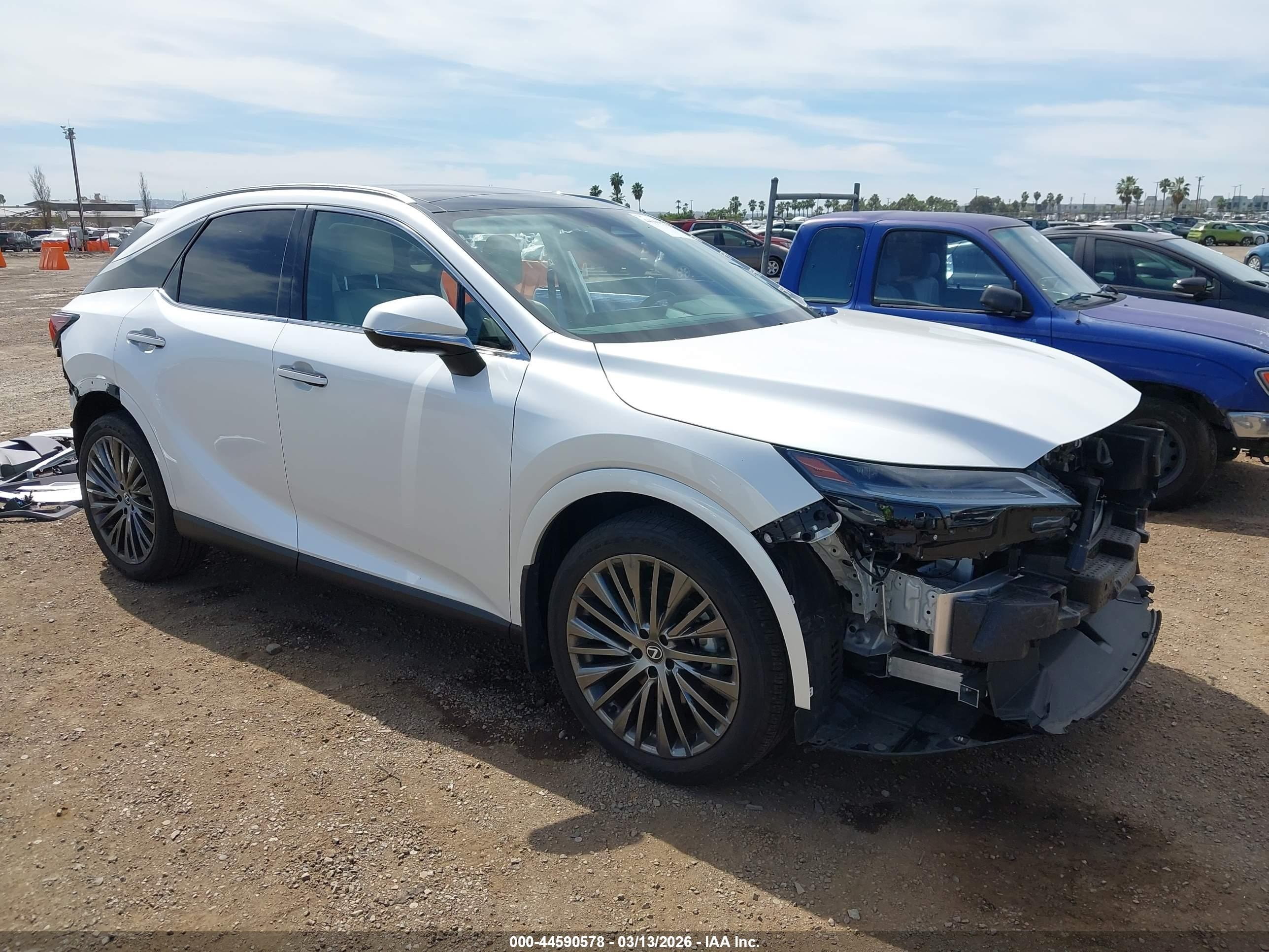 2023 Lexus RX 350h Premium Plus, VIN 2T2BBMCA4PC021539 — Side