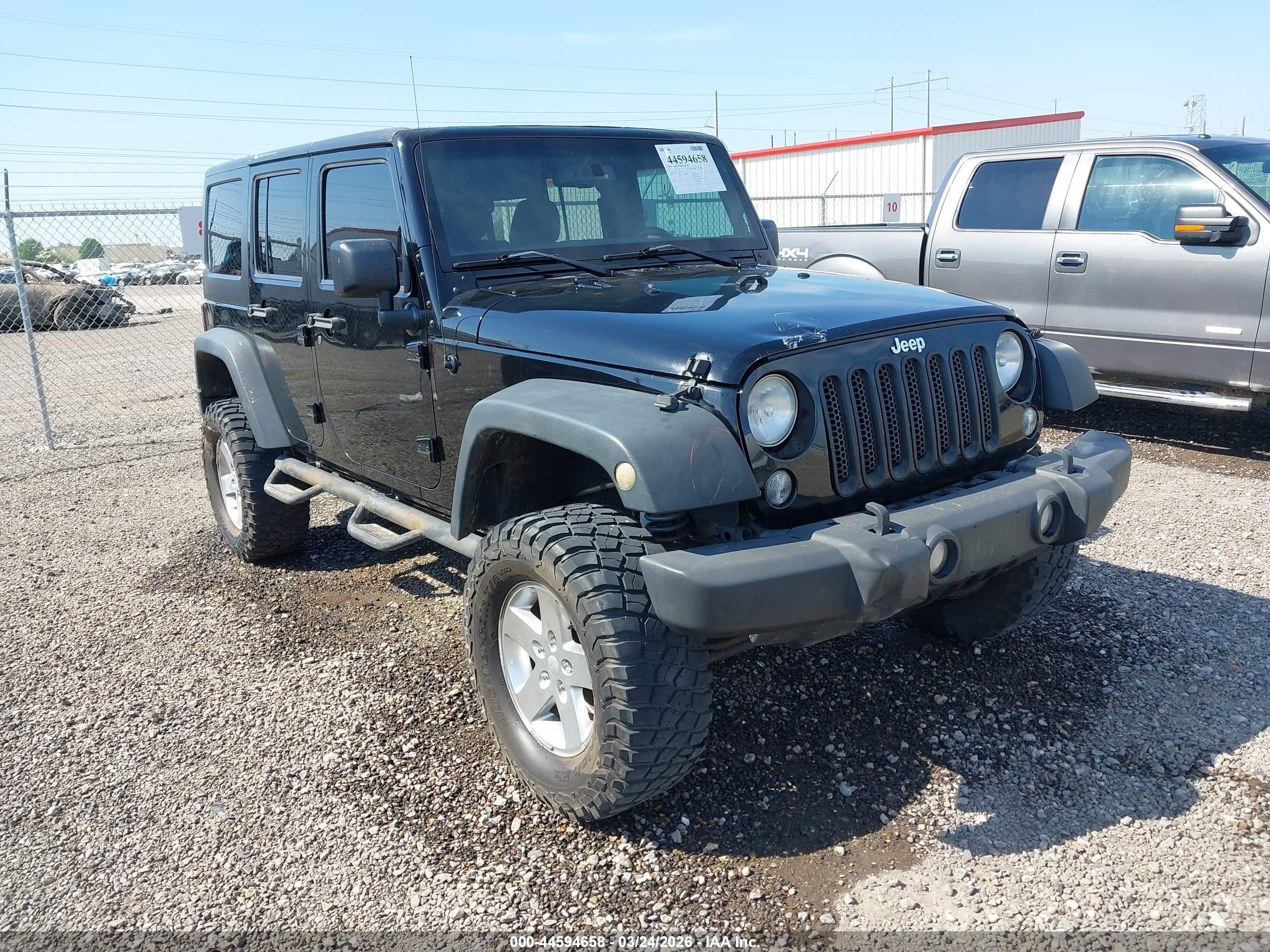 2015 Jeep Wrangler Unlimited Sport, VIN 1C4HJWDG1FL533055 — Storm