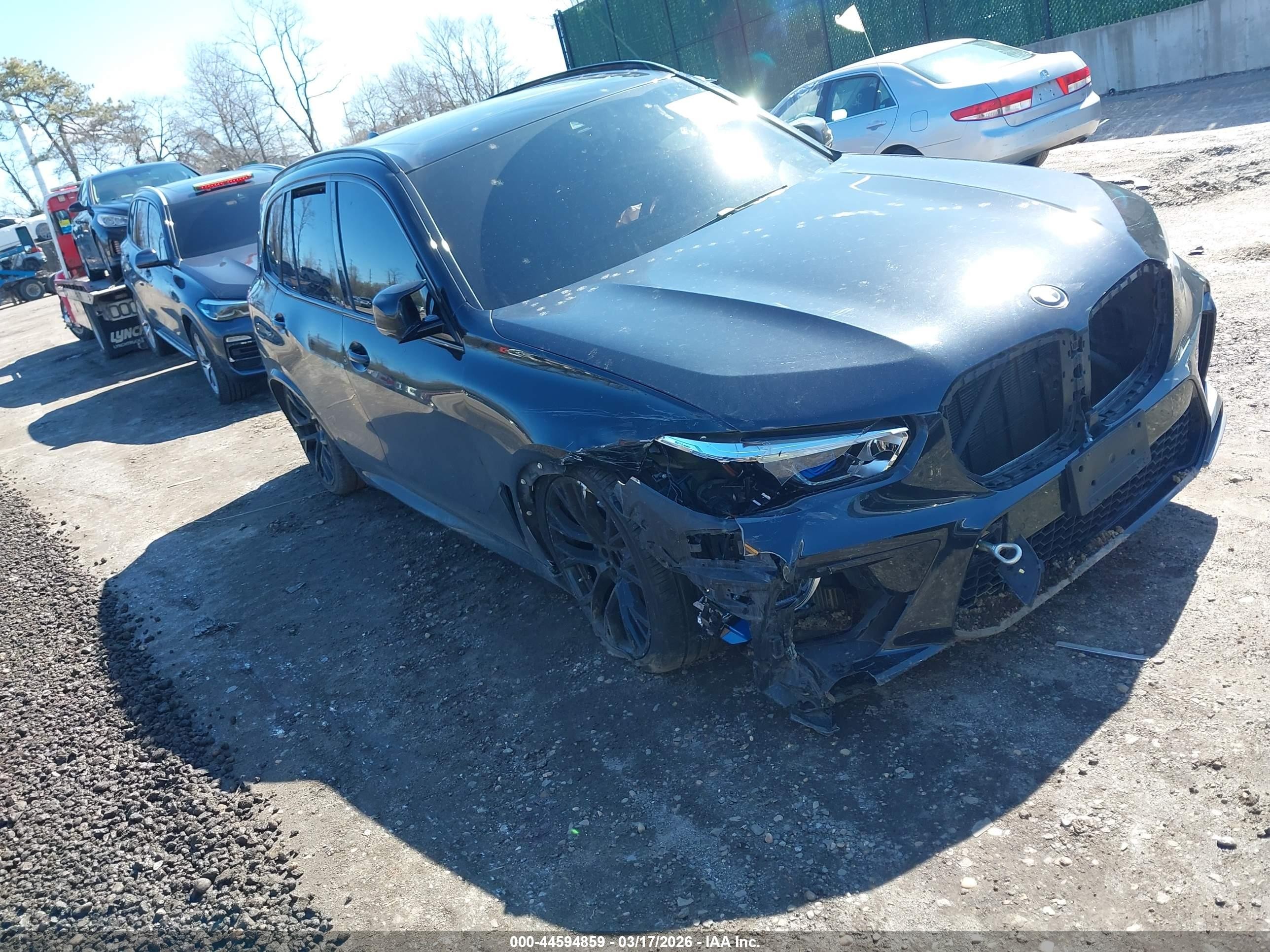 2021 BMW X5 M, VIN 5YMJU0C05M9G29415 — Side