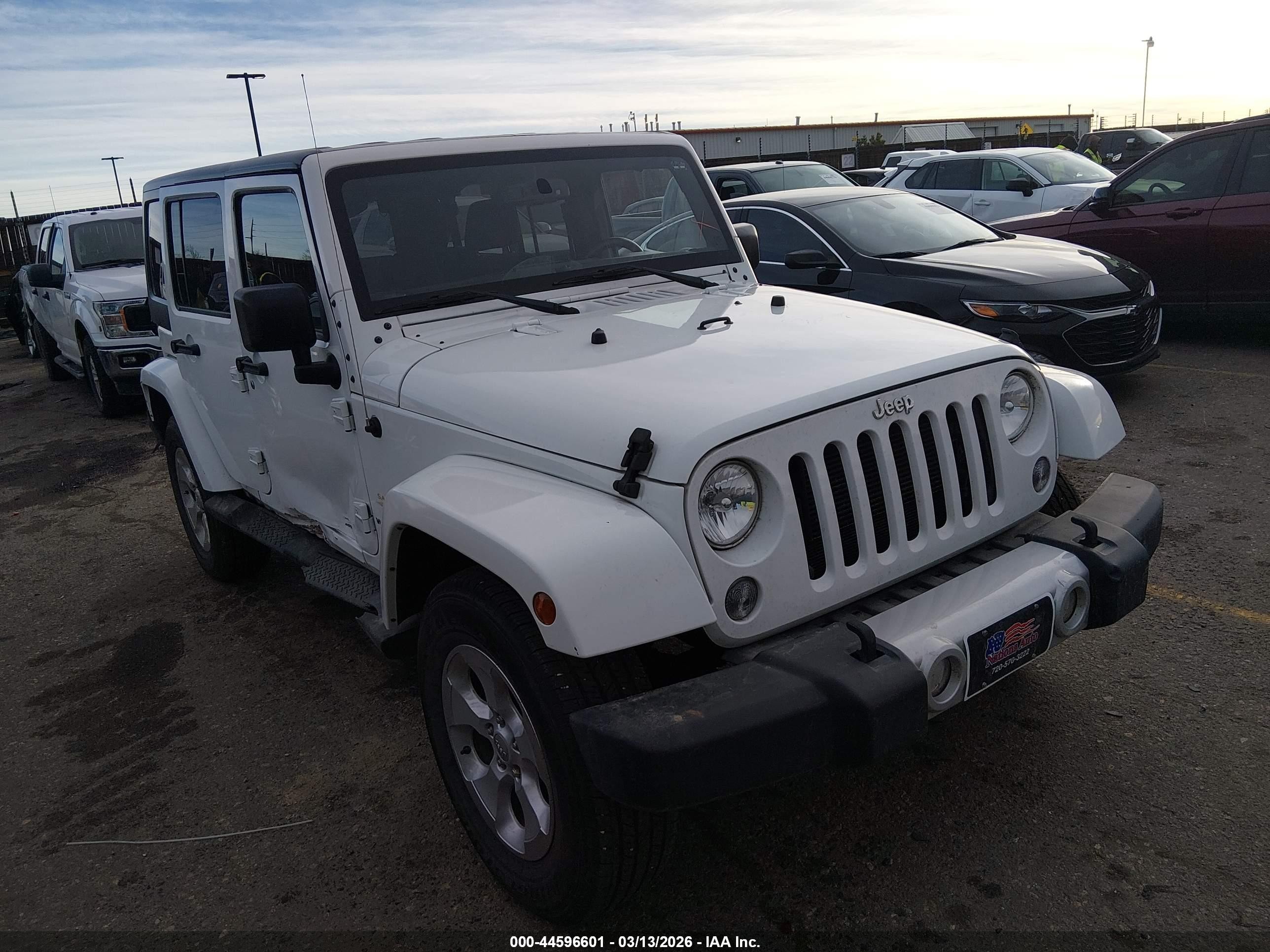 2015 Jeep Wrangler Unlimited Sahara, VIN 1C4BJWEG4FL543079 — Side