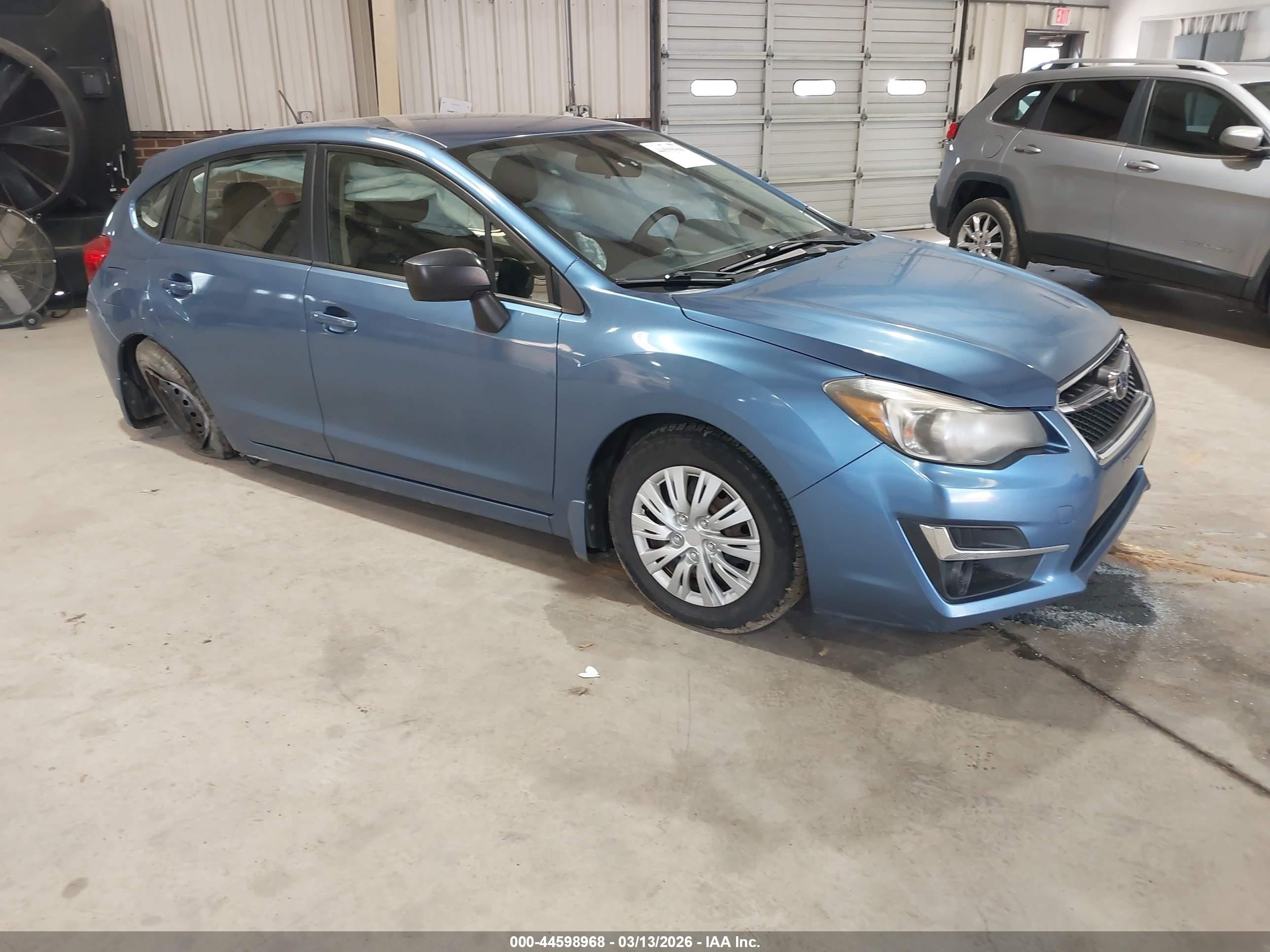 2015 Subaru Impreza 2.0i, VIN JF1GPAA69FH299118 — Side
