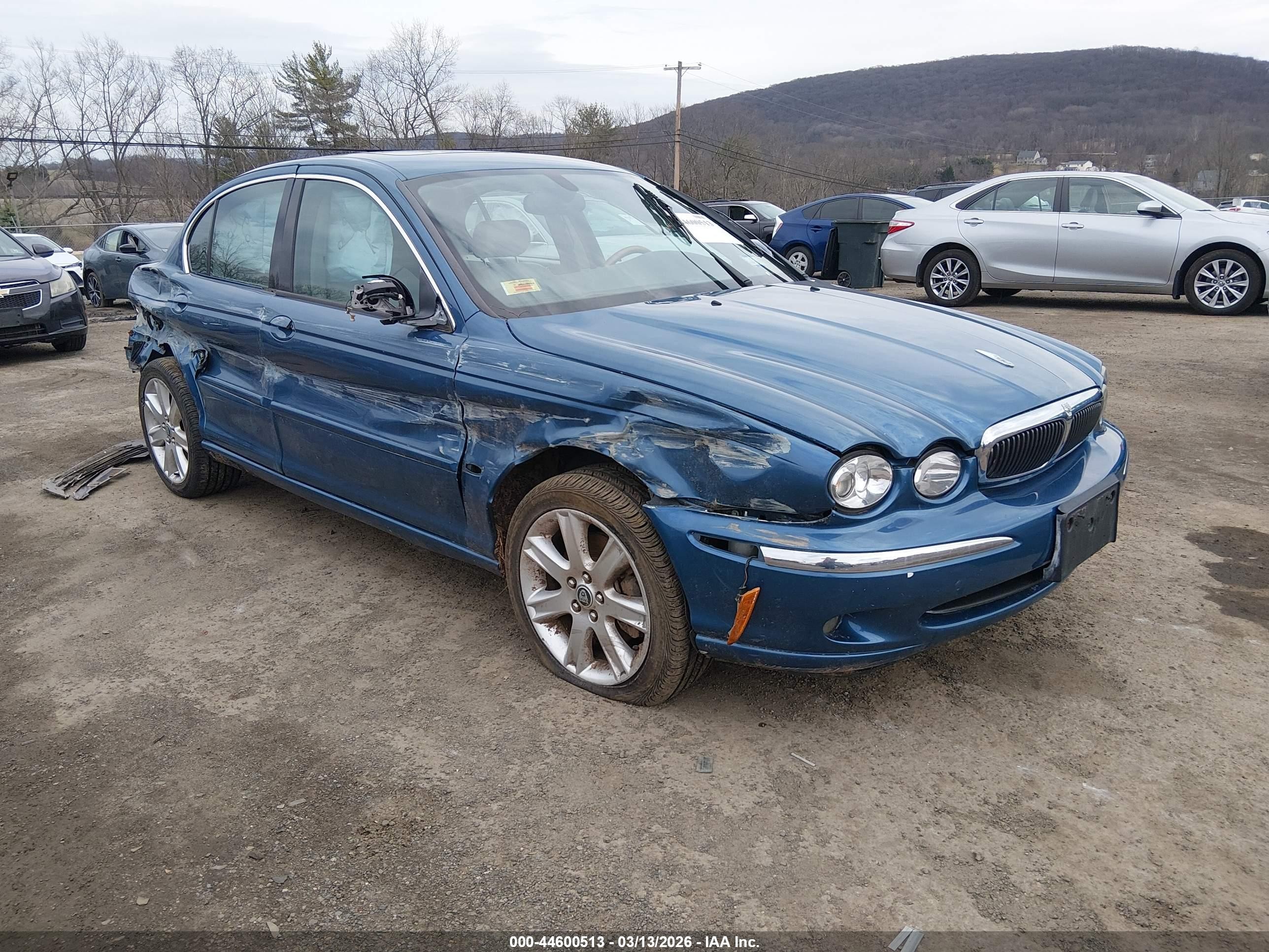 2003 Jaguar X-Type, VIN SAJEB51C73WD07032 — Бок