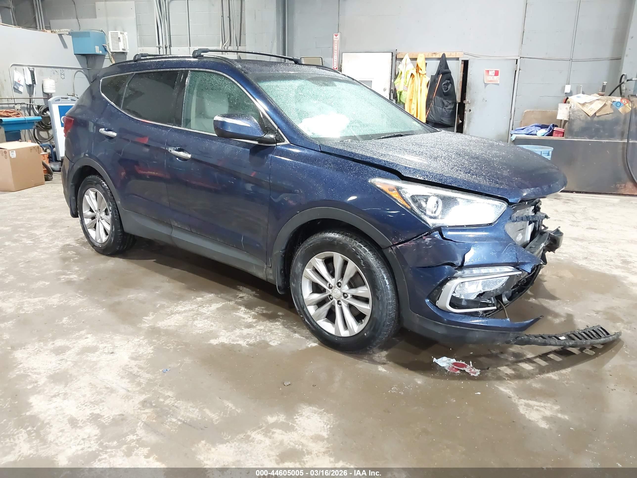 2017 Hyundai Santa Fe 2.0T, VIN 5XYZUDLA2HG503283 — Front end