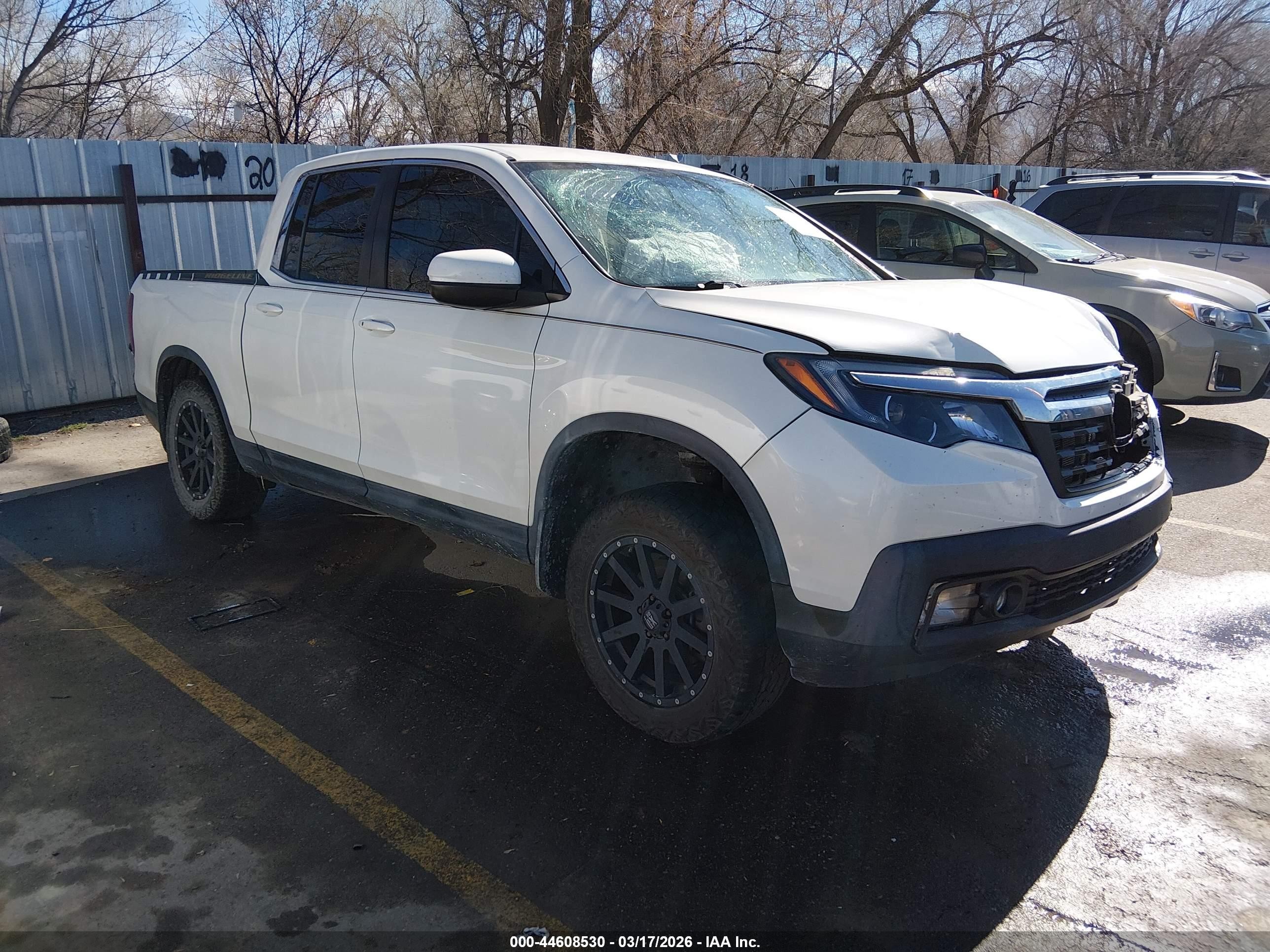 2017 Honda Ridgeline RTL, VIN 5FPYK3F58HB029302 — Side