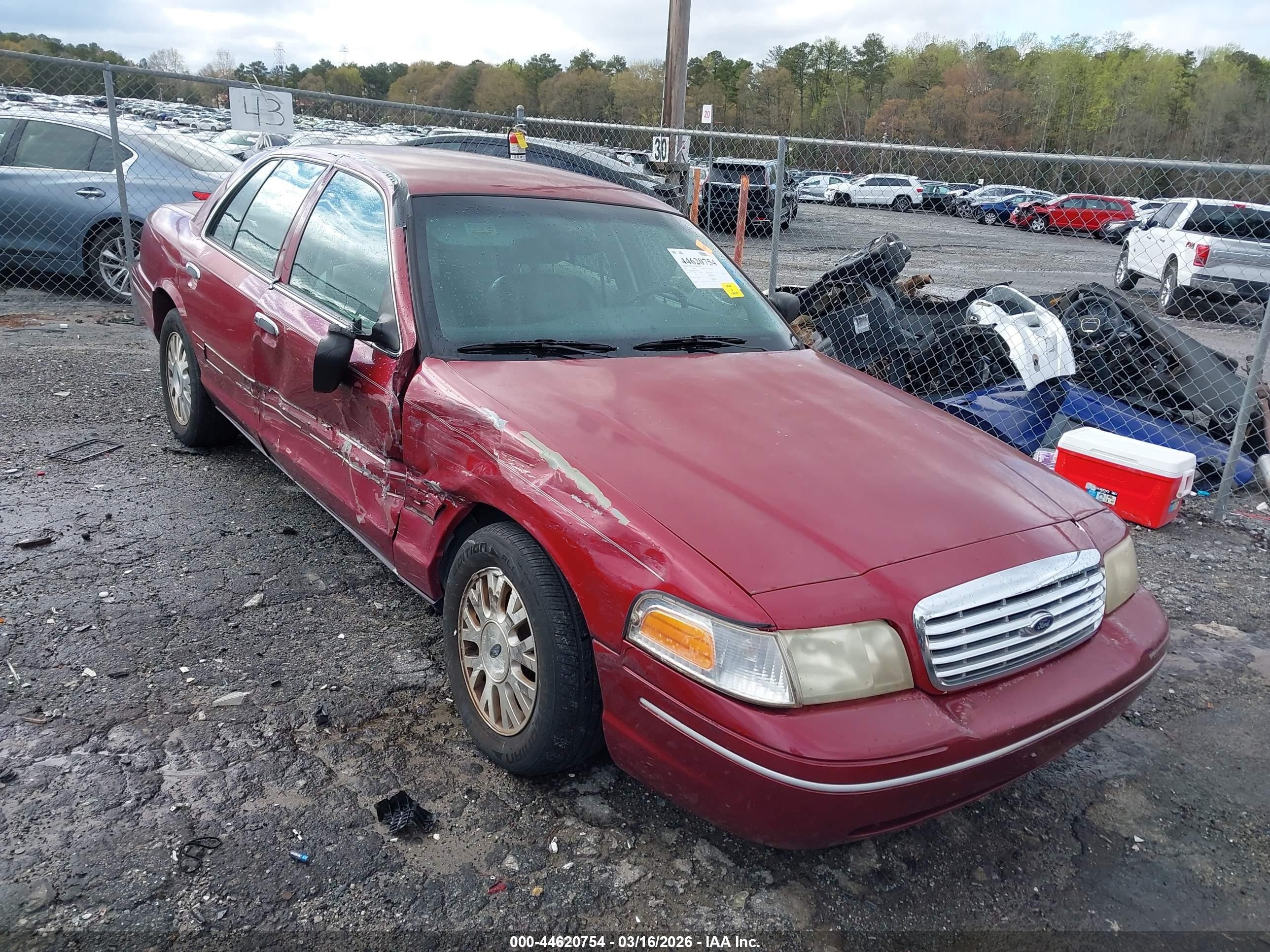 2003 Ford Crown Victoria LX, VIN 2FAFP74W03X214852 — Side