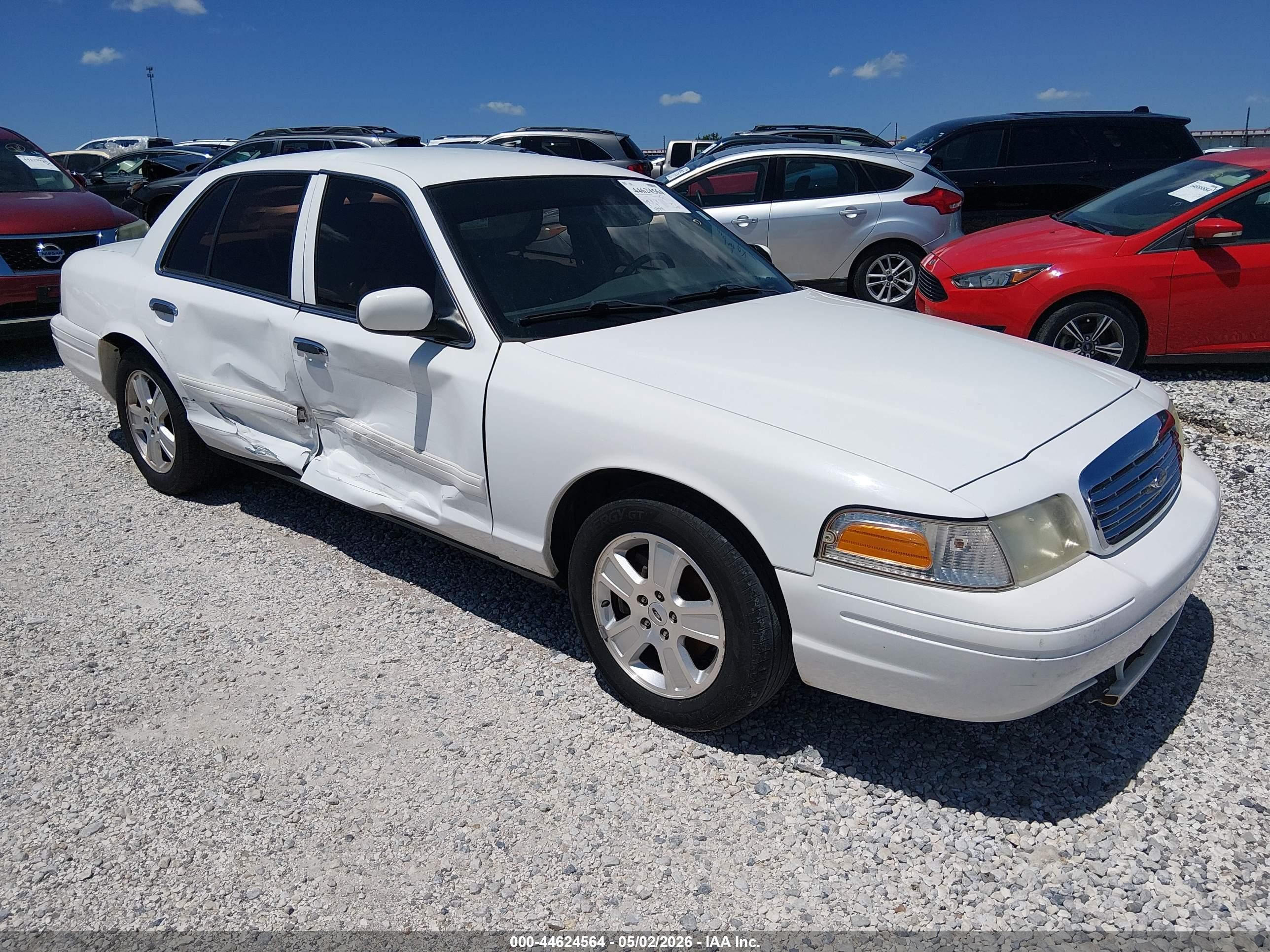 2011 Ford Crown Victoria LX, VIN 2FABP7EV7BX174613 — Side