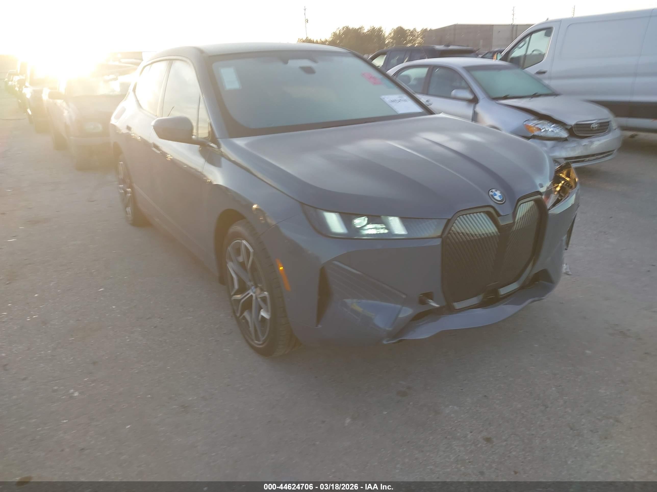 2026 BMW iX xDrive45, VIN WB543CF01TCW65392 — Side
