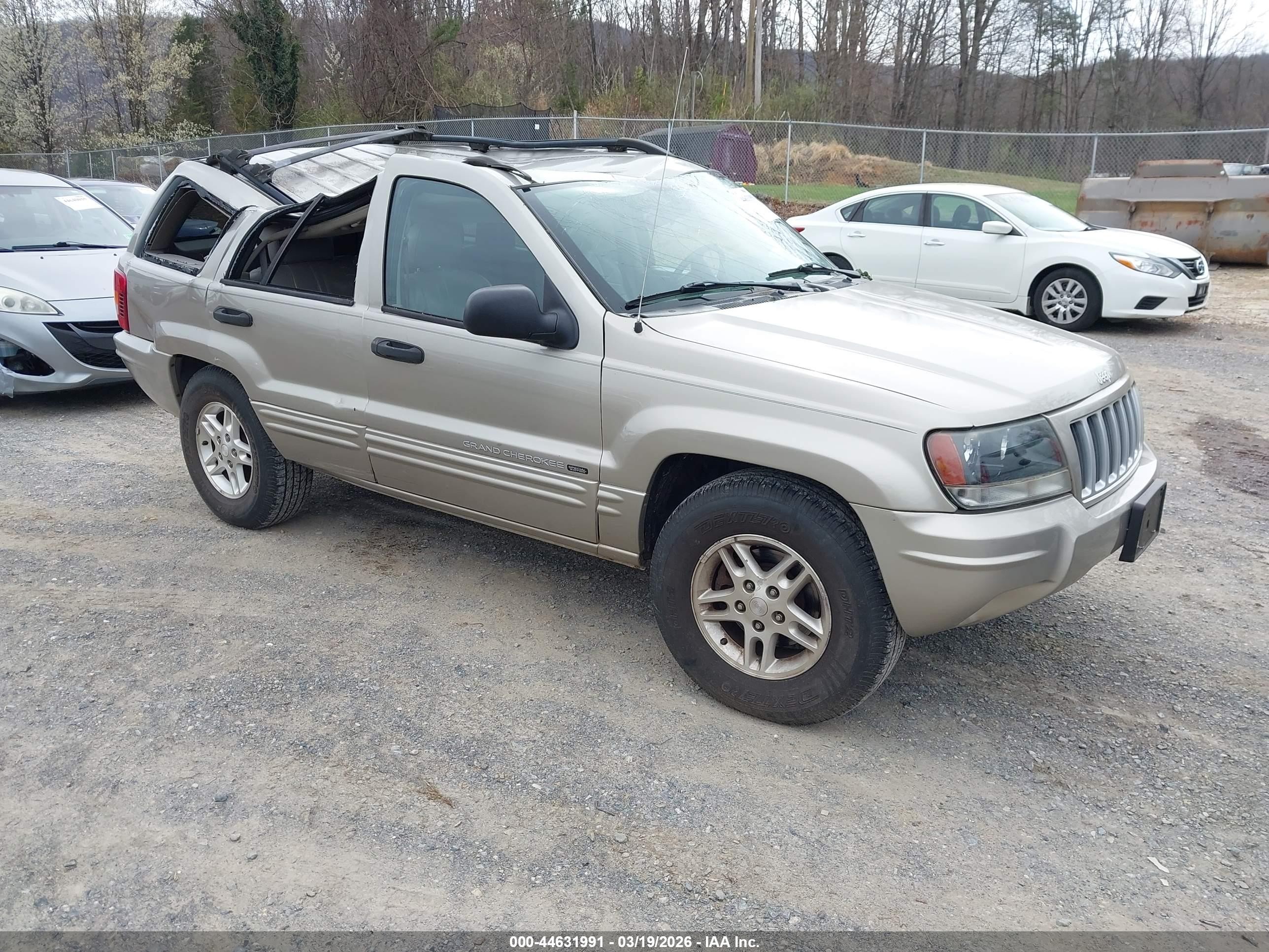 2004 Jeep Grand Cherokee Laredo, VIN 1J4GW48S24C104322 — Storm