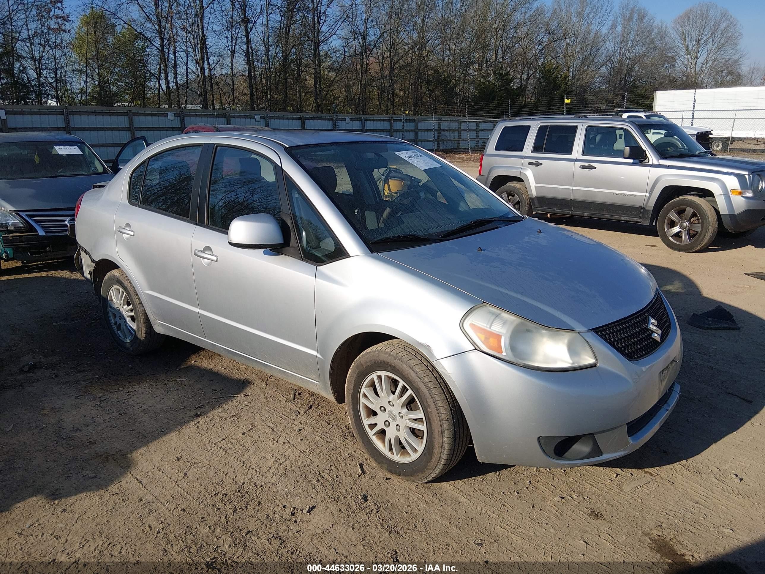 2012 Suzuki SX4 LE, VIN JS2YC5A37C6303655 — Rear end