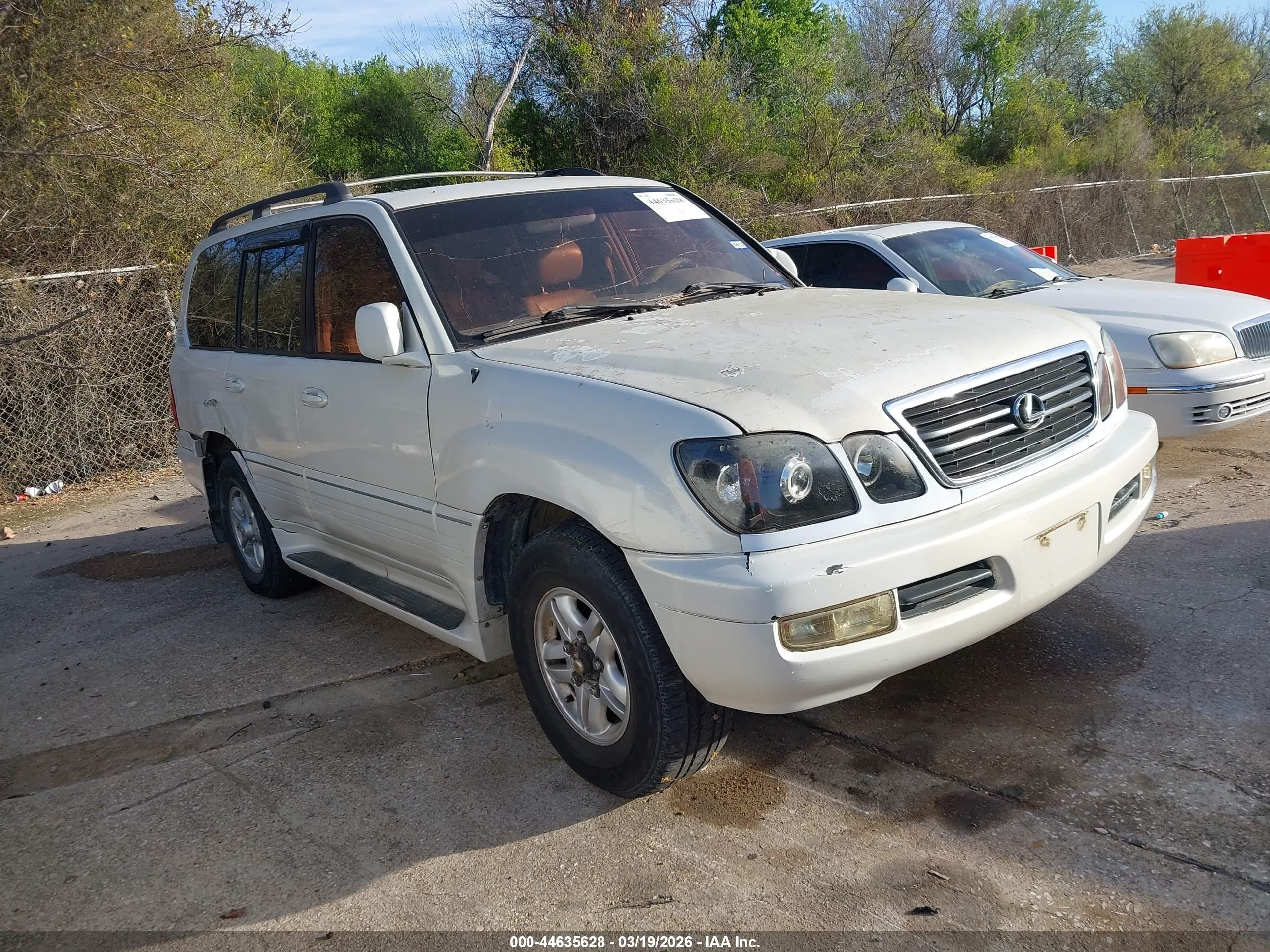 1998 Lexus LX 470, VIN JT6HT00W6W0021739 — Бок