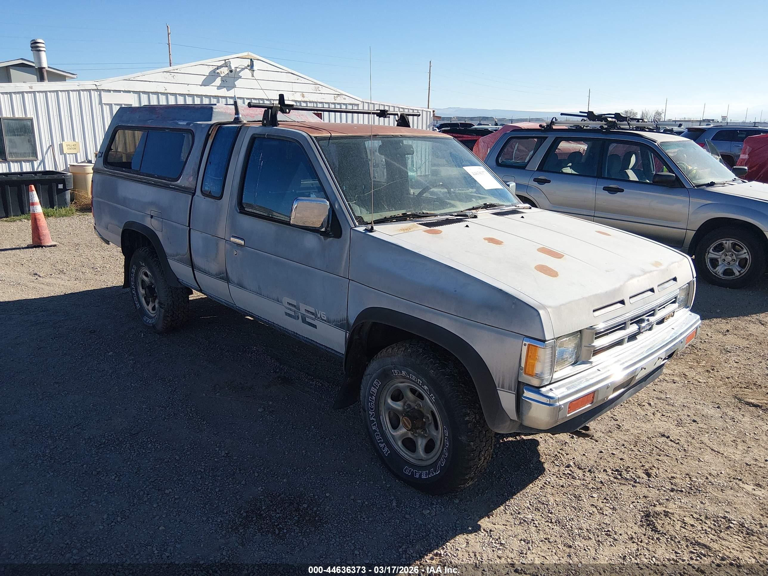 1992 Nissan Frontier SE, VIN 1N6HD16Y1NC306329 — Side