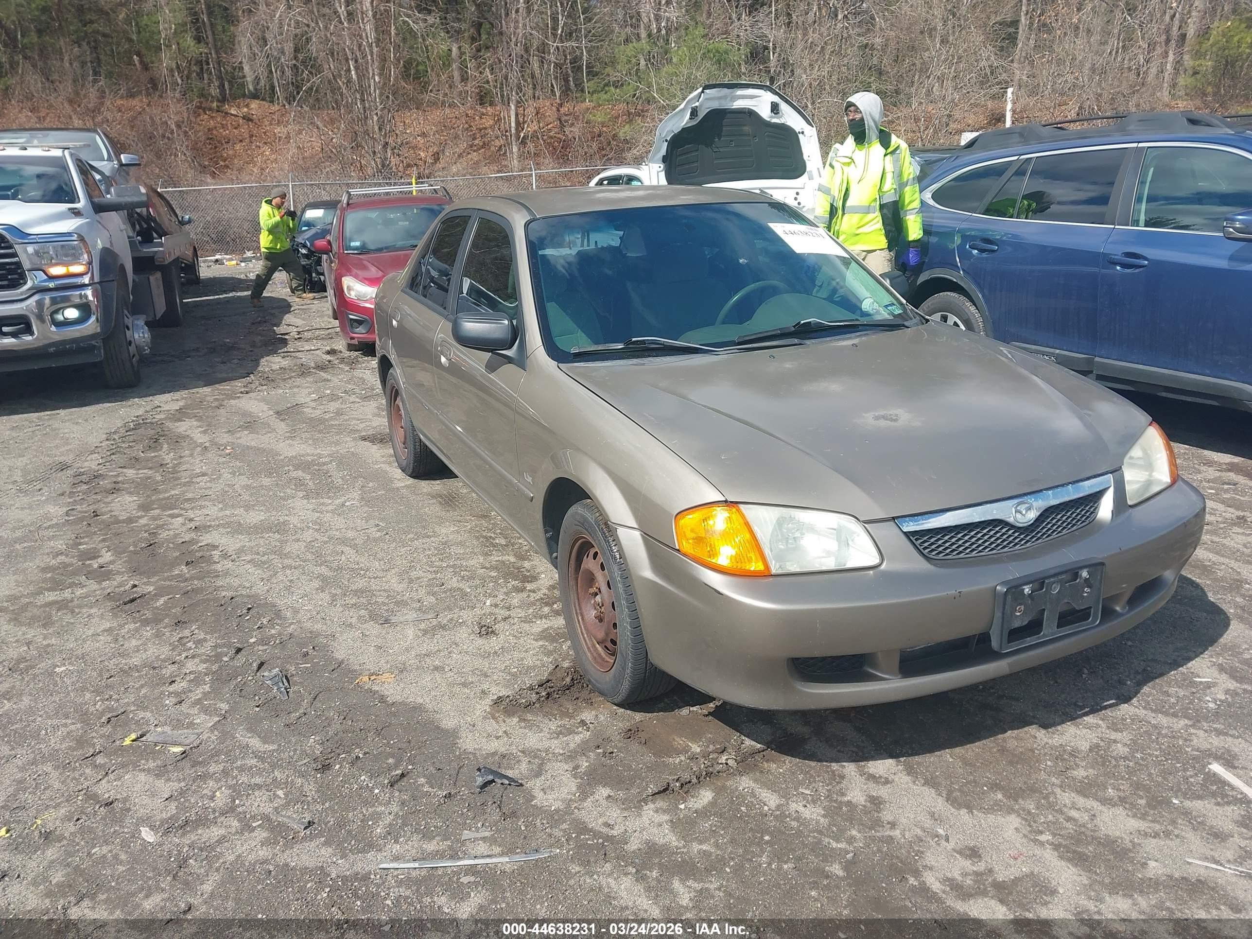 2000 Mazda Protege DX, VIN JM1BJ2222Y0244244 — Normal wear