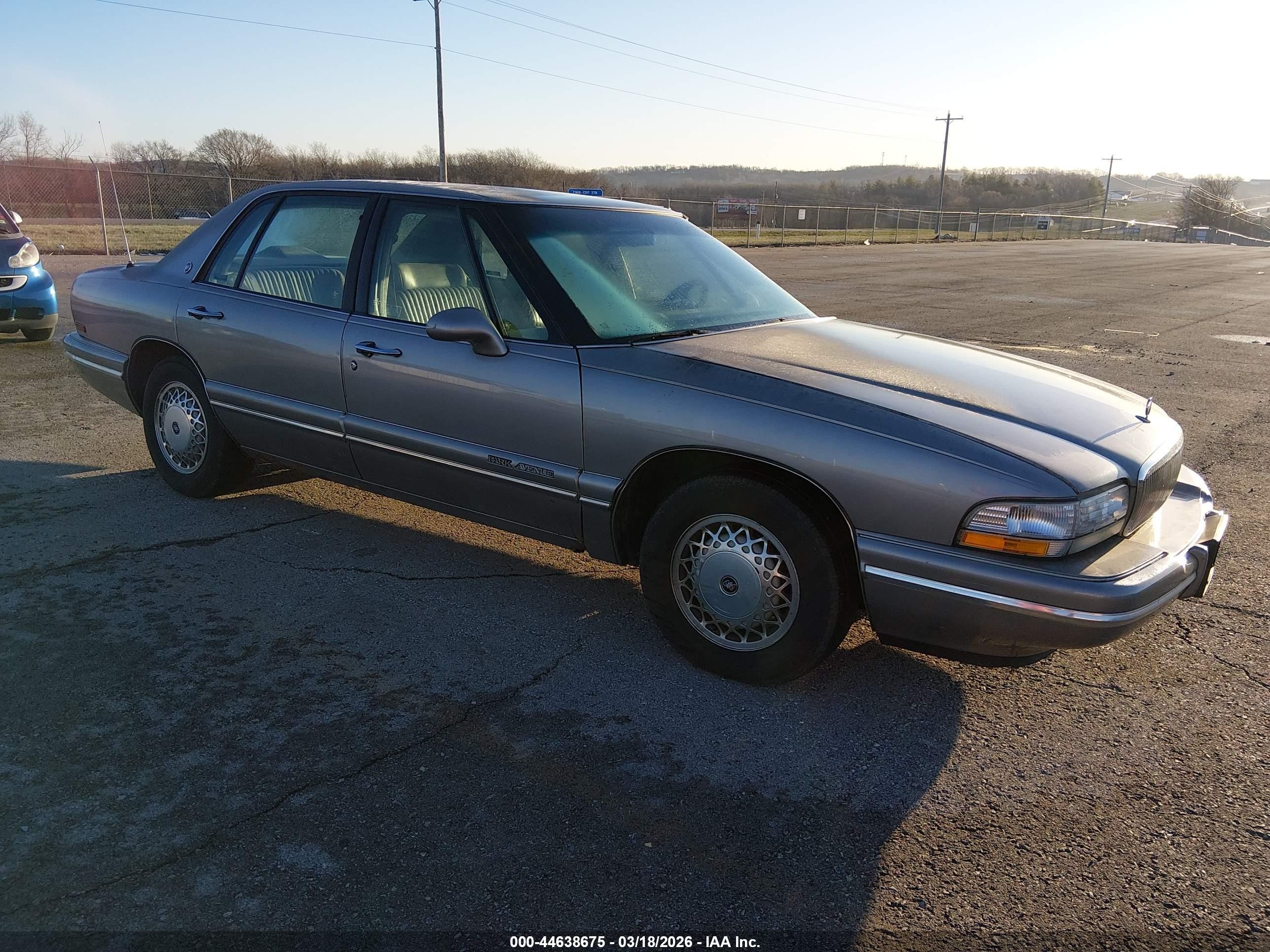 1995 Buick Park Avenue, VIN 1G4CW52K9SH614410 — Side