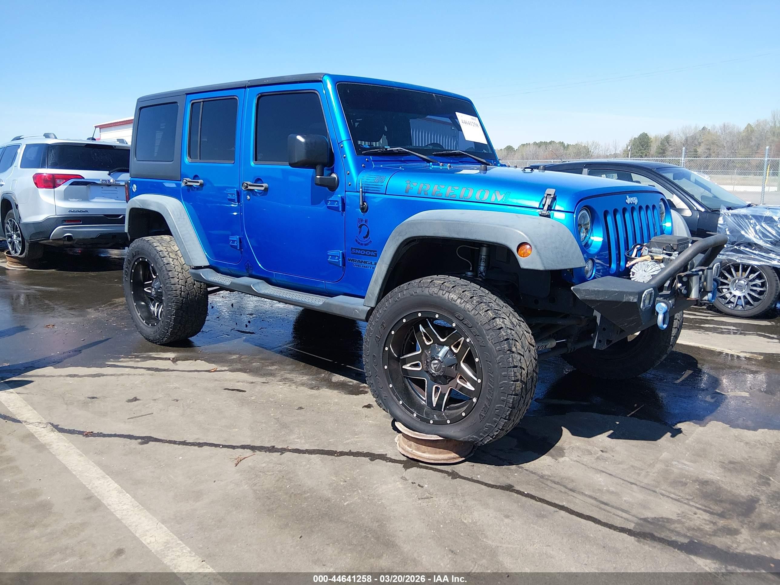 2015 Jeep Wrangler Unlimited Willys Wheeler, VIN 1C4BJWDG7FL518677 — Front end