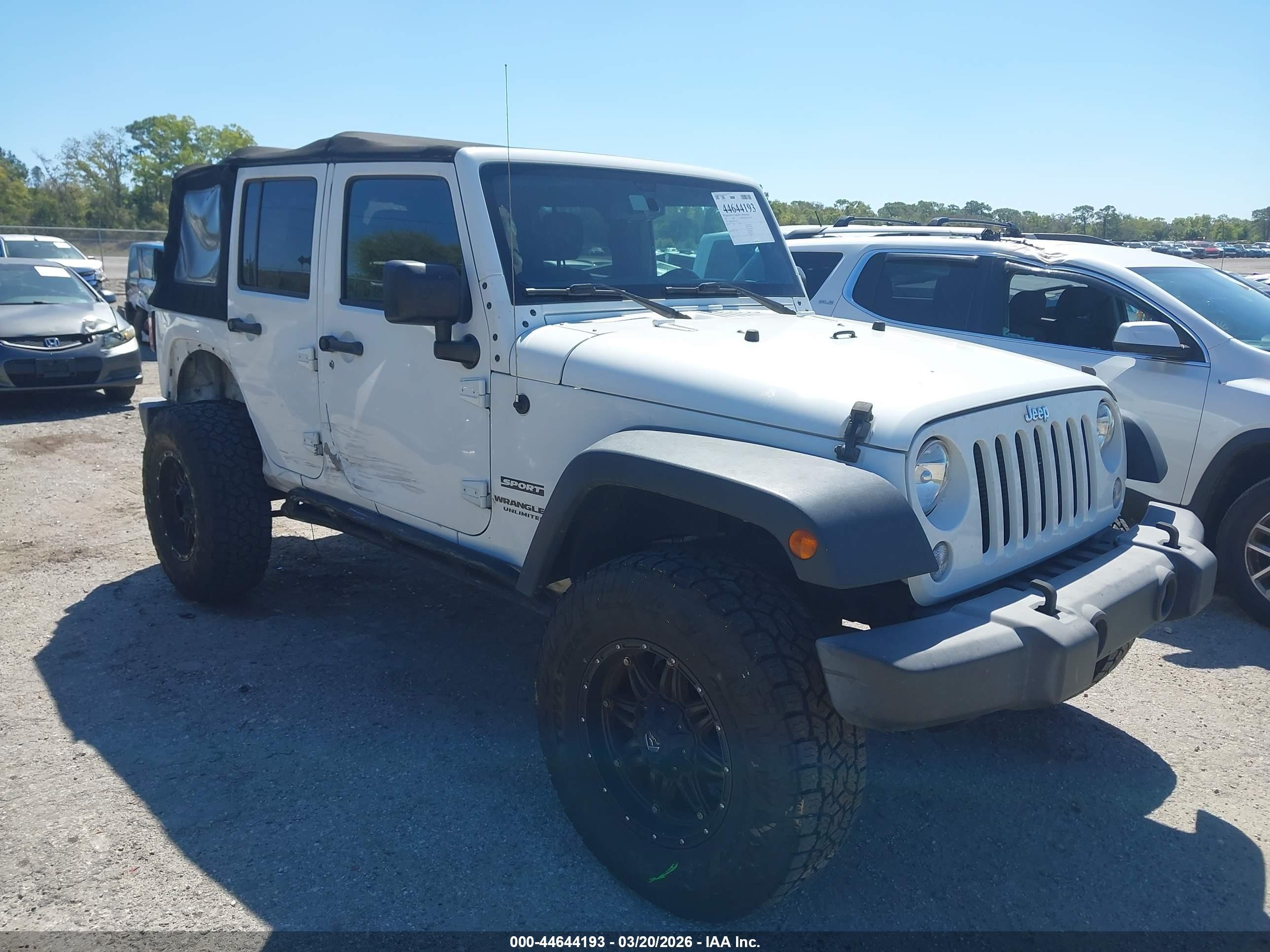 2017 Jeep Wrangler Unlimited Sport, VIN 1C4BJWDG6HL614013 — Side