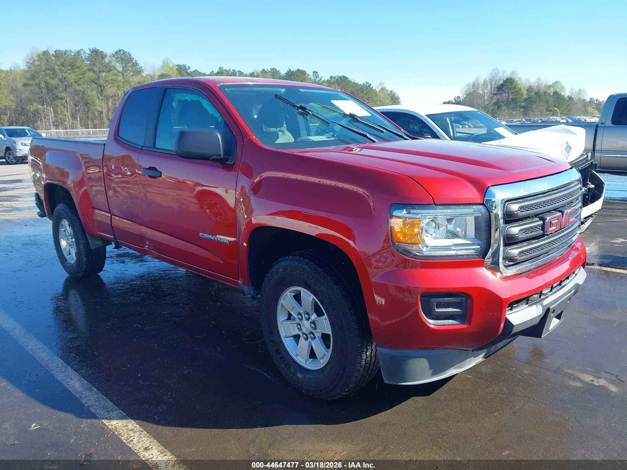 2015 GMC Canyon 2WD, VIN 1GTH5AEA5F1159000 — Side