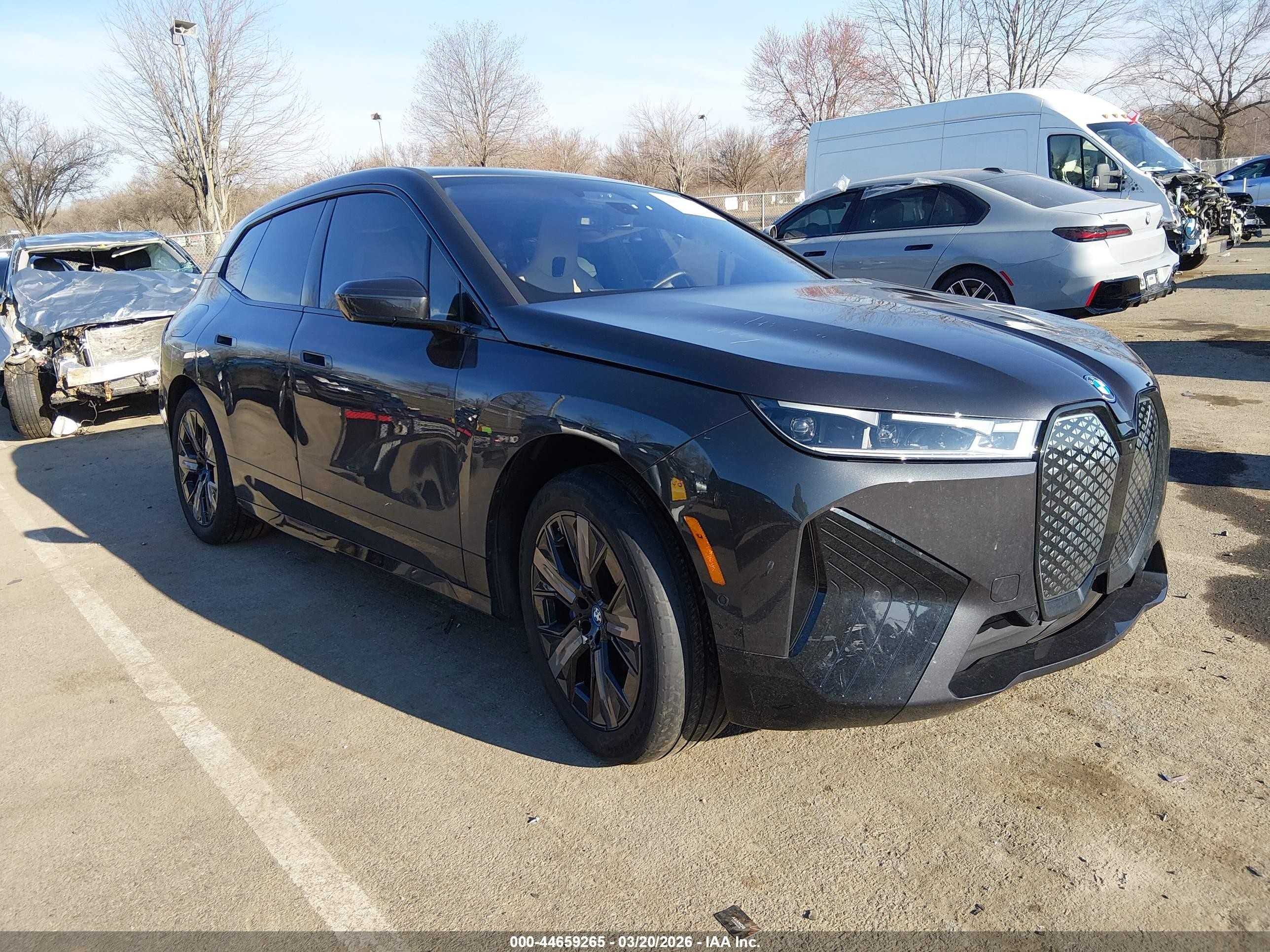 2024 BMW iX xDrive50, VIN WB523CF09RCR00346 — Side