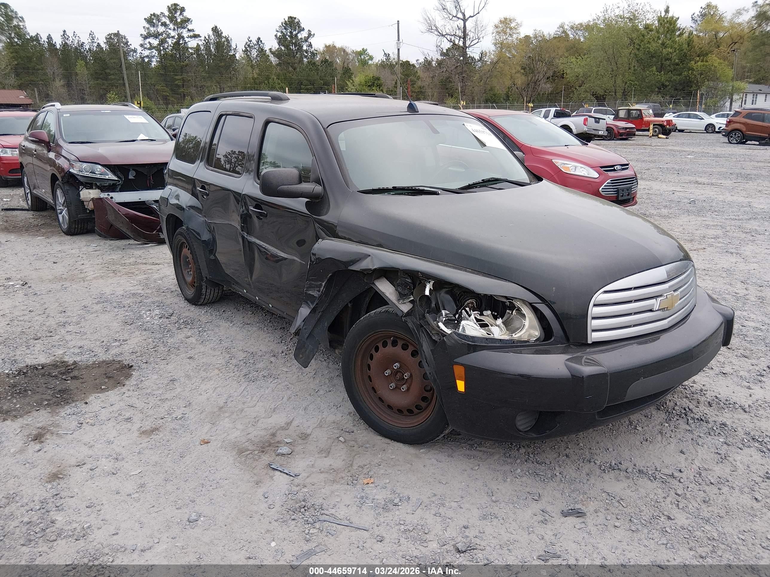 2011 Chevrolet HHR LS, VIN 3GNBAAFW1BS548552 — Side