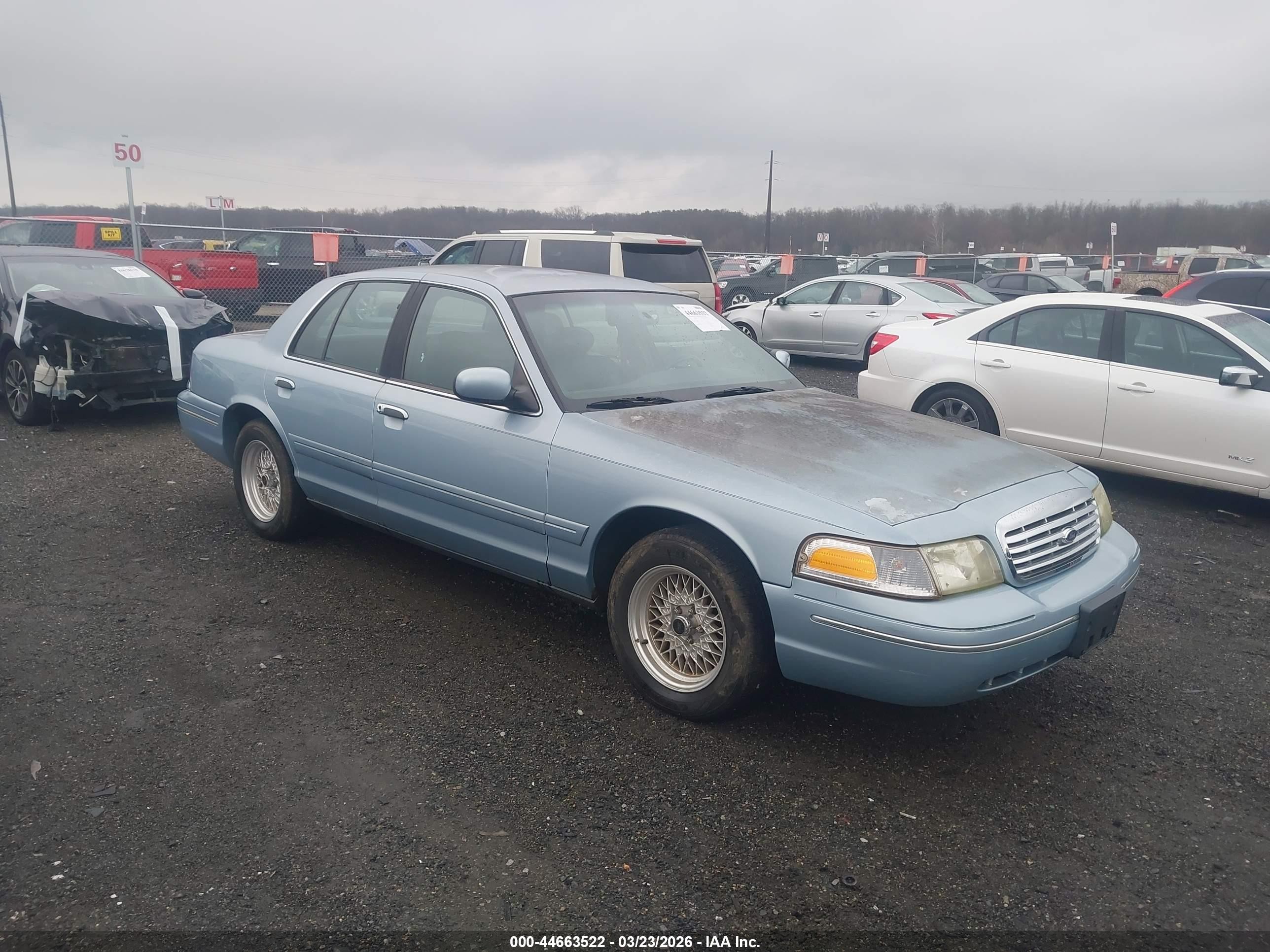 1999 Ford Crown Victoria LX, VIN 2FAFP74W0XX150107 — Normal wear