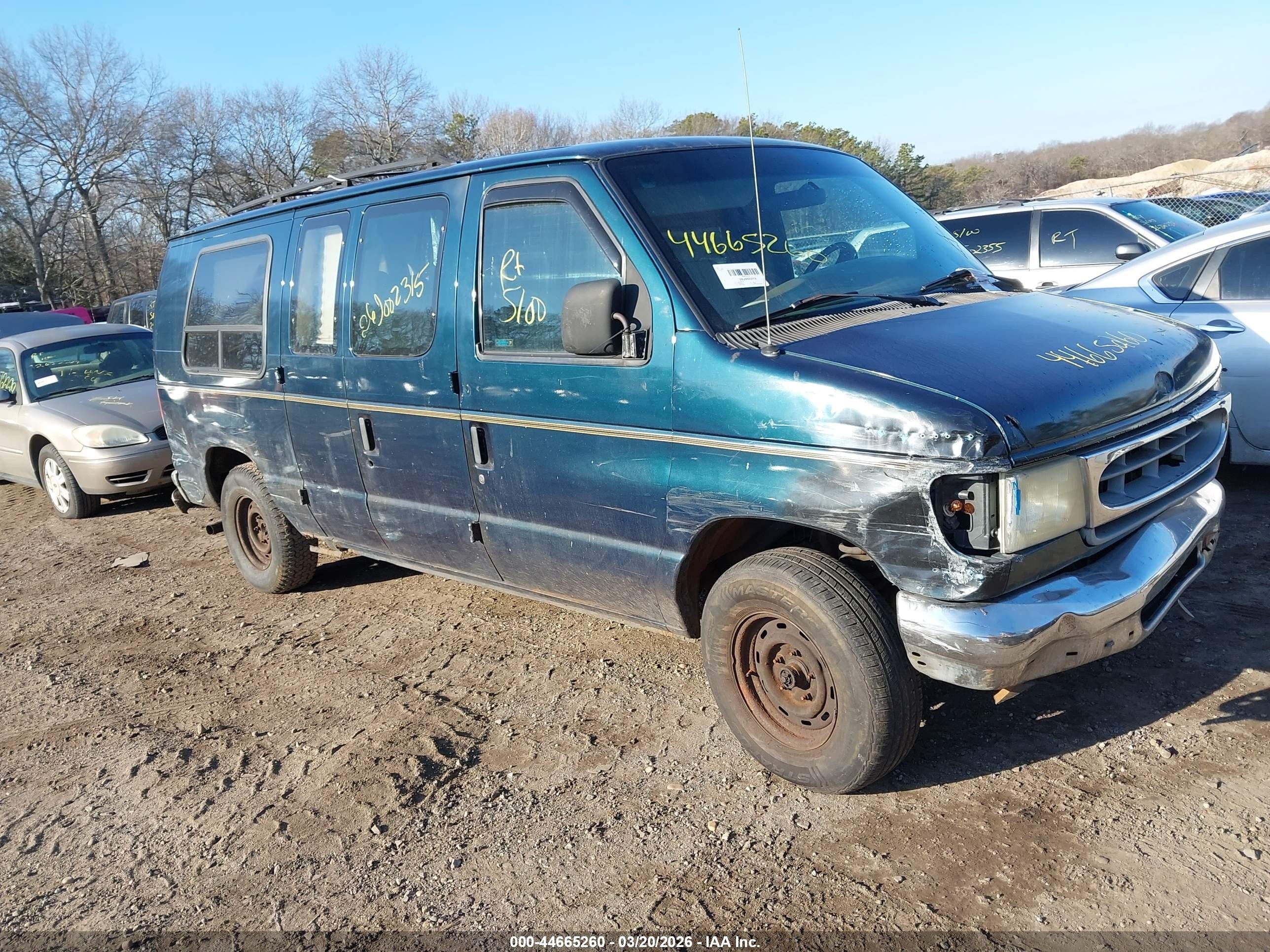 1998 Ford E-150, VIN 1FDRE1420WHA16019 — Side