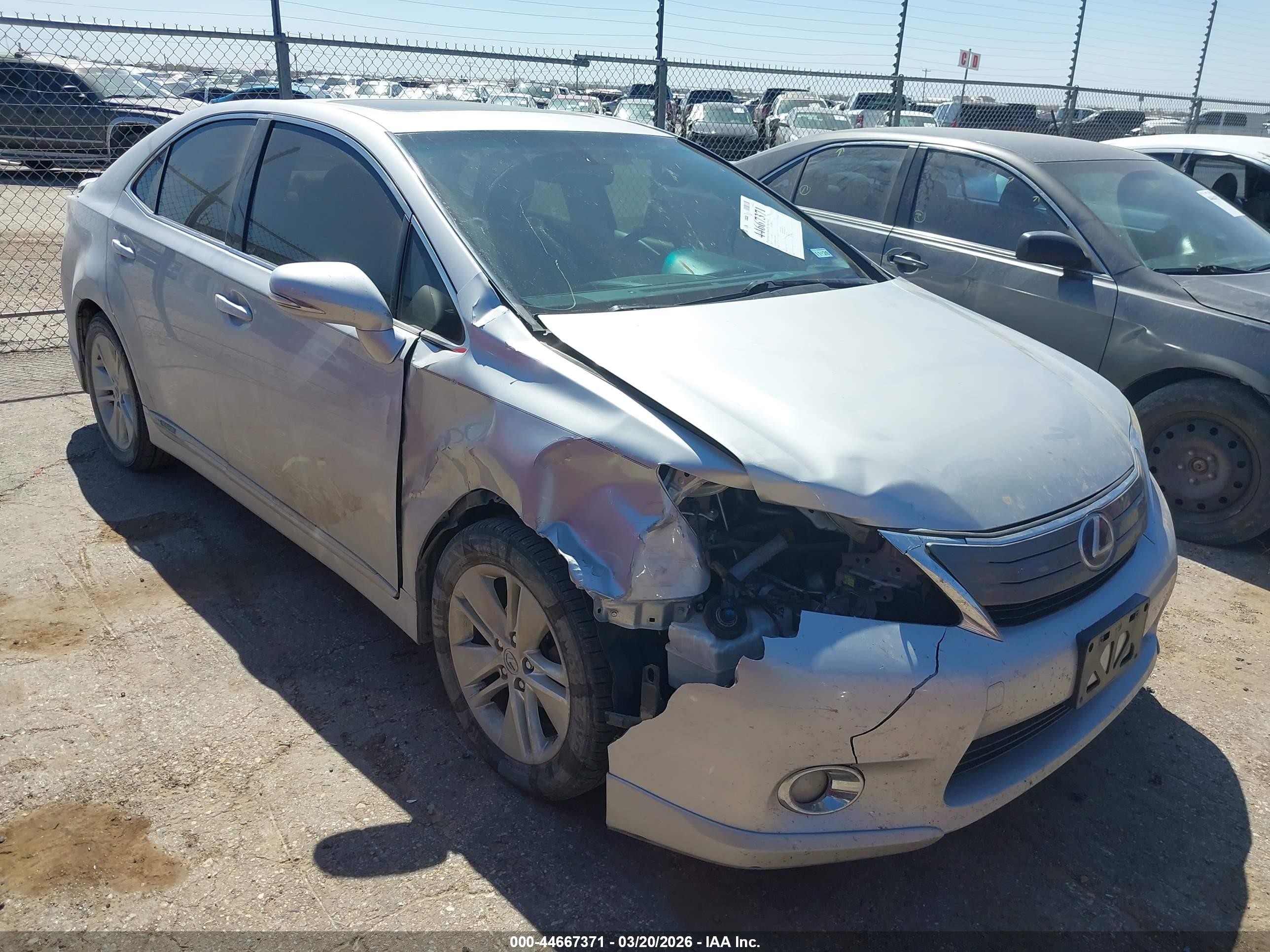 2012 Lexus HS 250h, VIN JTHBB1BA7C2050884 — Side