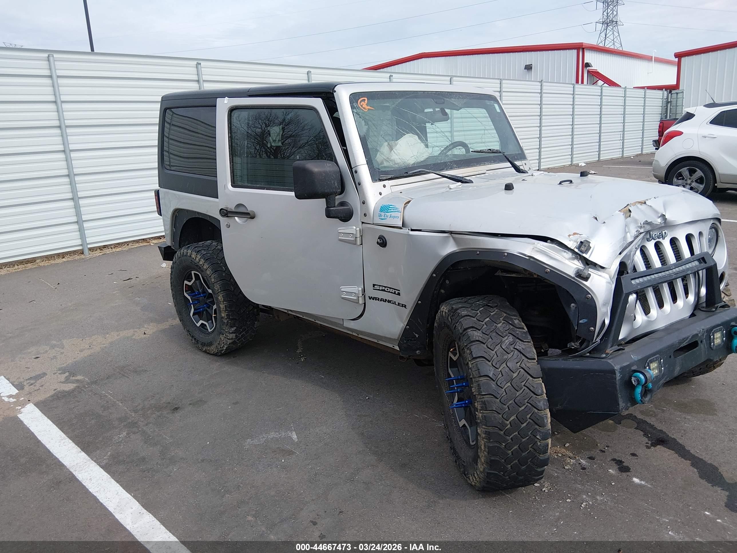 2012 Jeep Wrangler Sport, VIN 1C4GJWAG3CL109176 — Front end