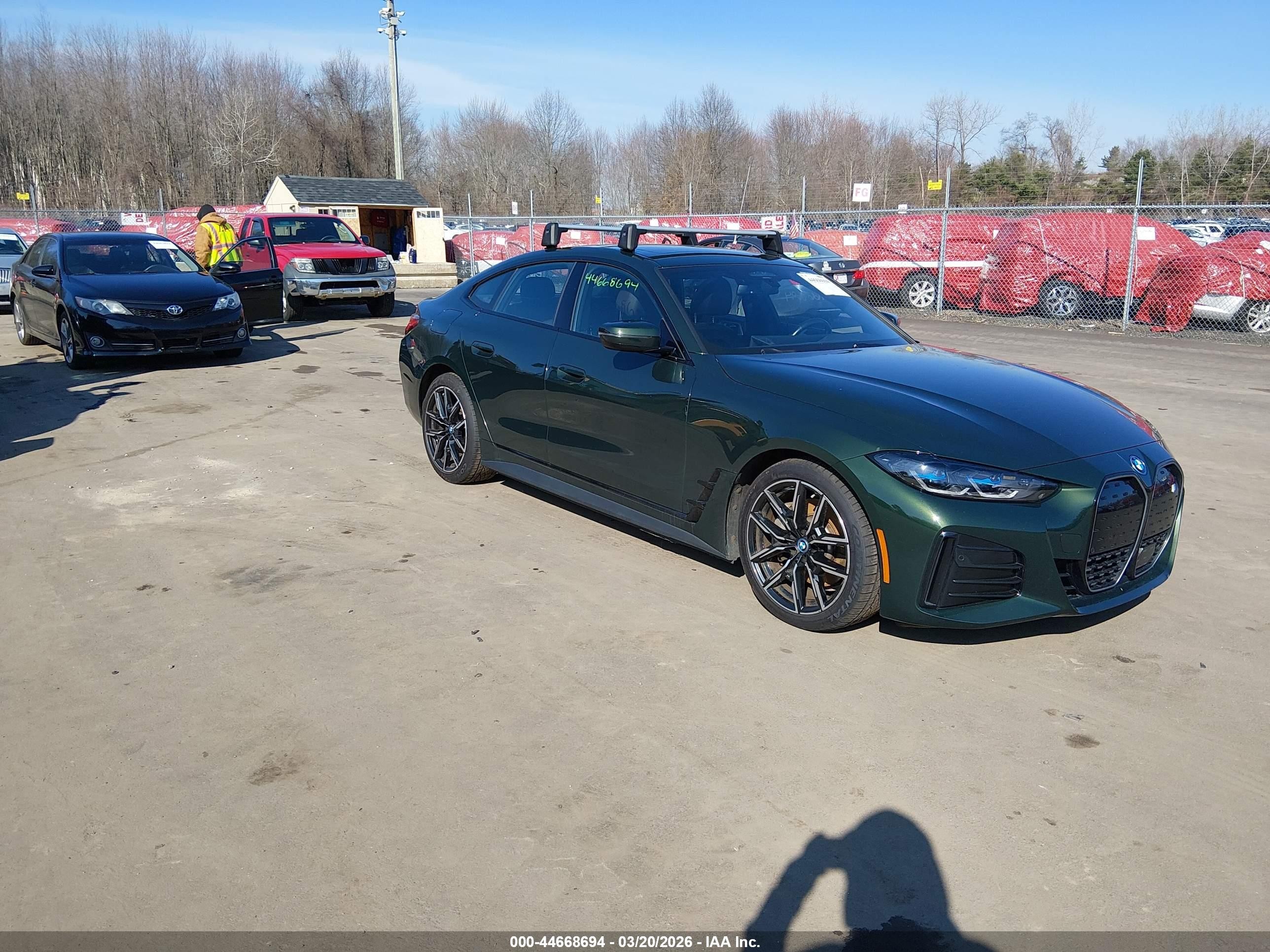 2022 BMW i4 eDrive40, VIN WBY73AW00NFN17434 — Side