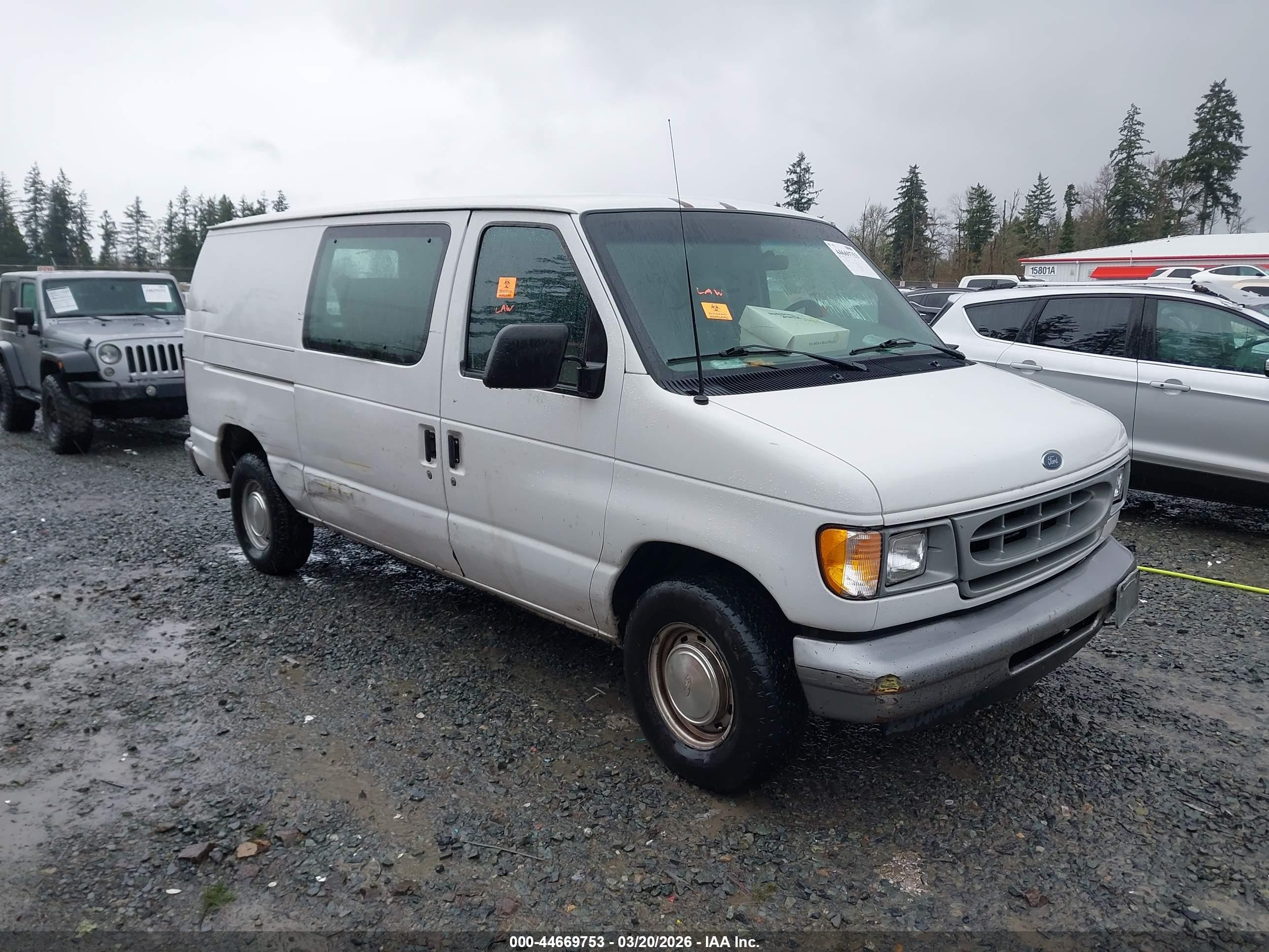 2002 Ford Econoline Cargo, VIN 1FTRE14212HB29279 — Theft recovery