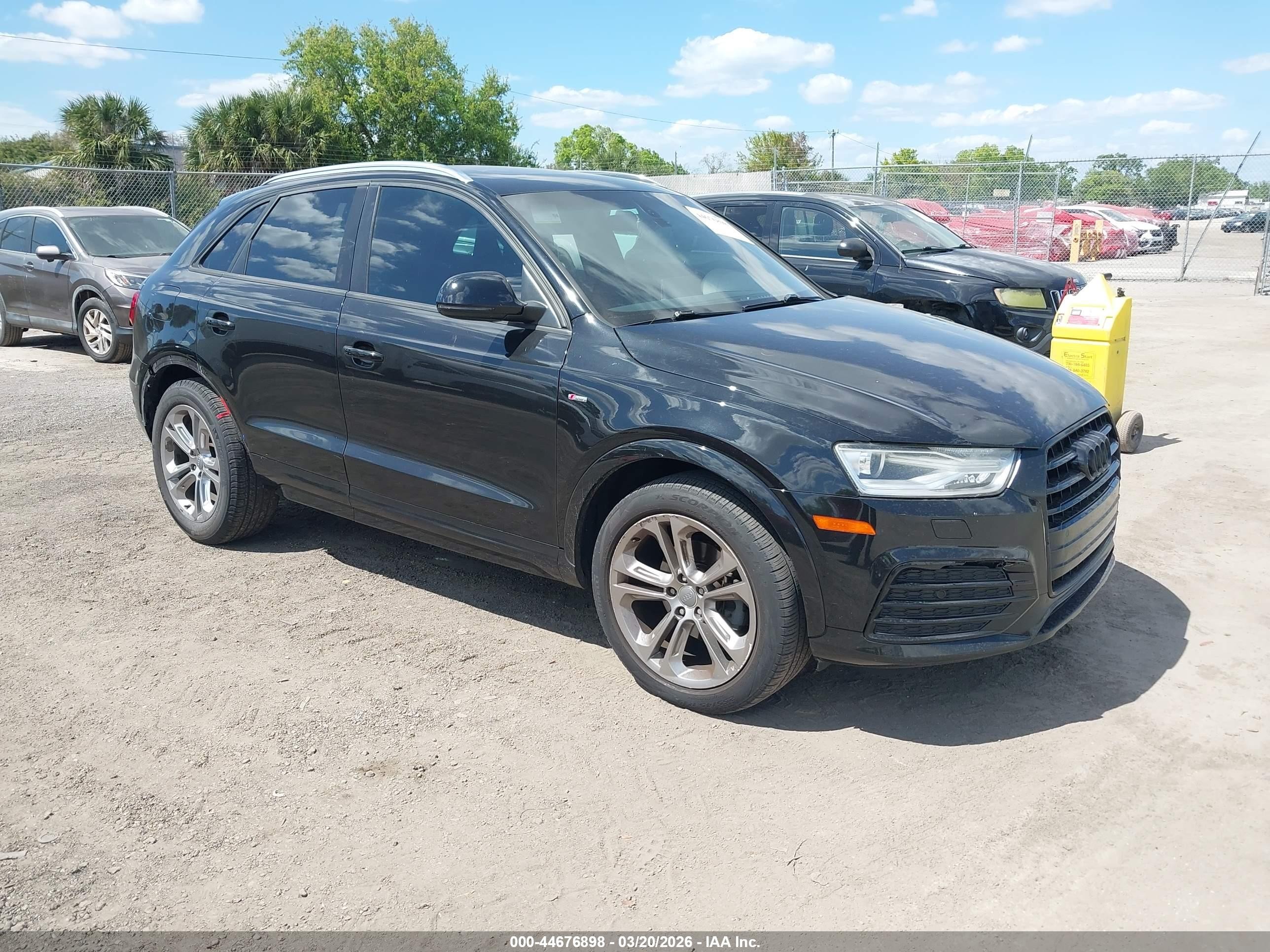 2018 Audi Q3 Premium, VIN WA1BCCFS4JR019443 — Rear end