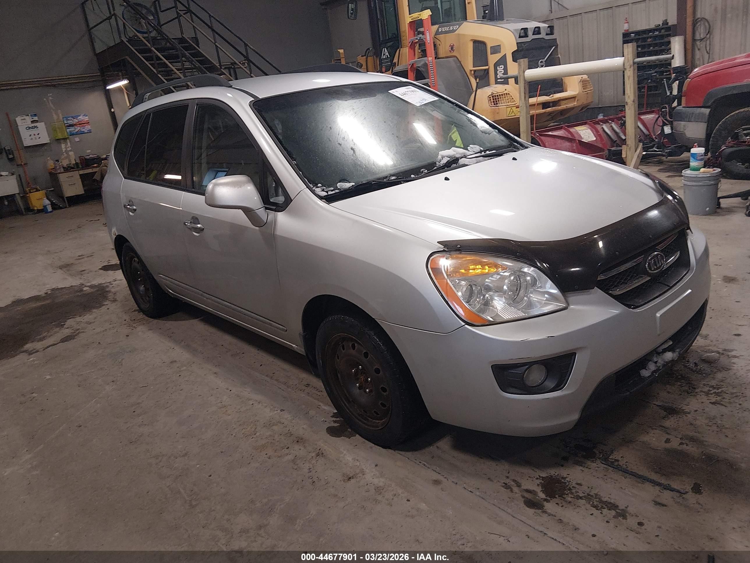 2010 Kia Rondo, VIN KNAHH8A84A7305067 — Side