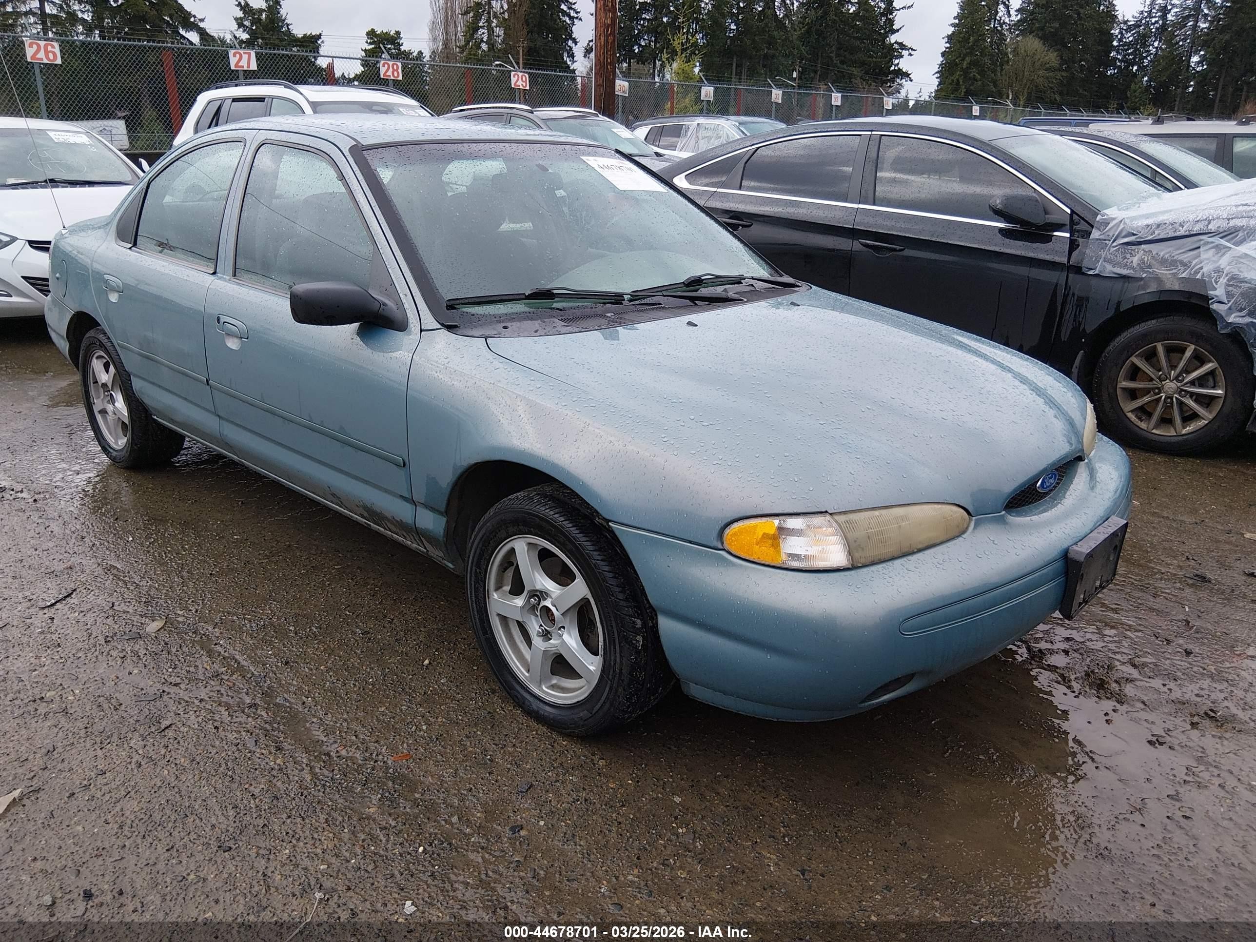 1997 Ford Contour LX, VIN 1FALP653XVK157146 — Side
