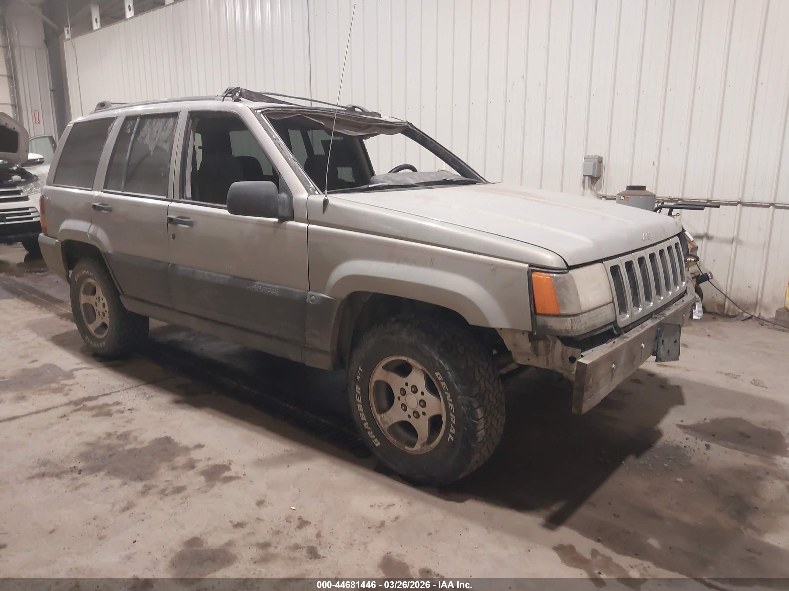 1997 Jeep Grand Cherokee Laredo, VIN 1J4GZ58S3VC685814 — Rollover