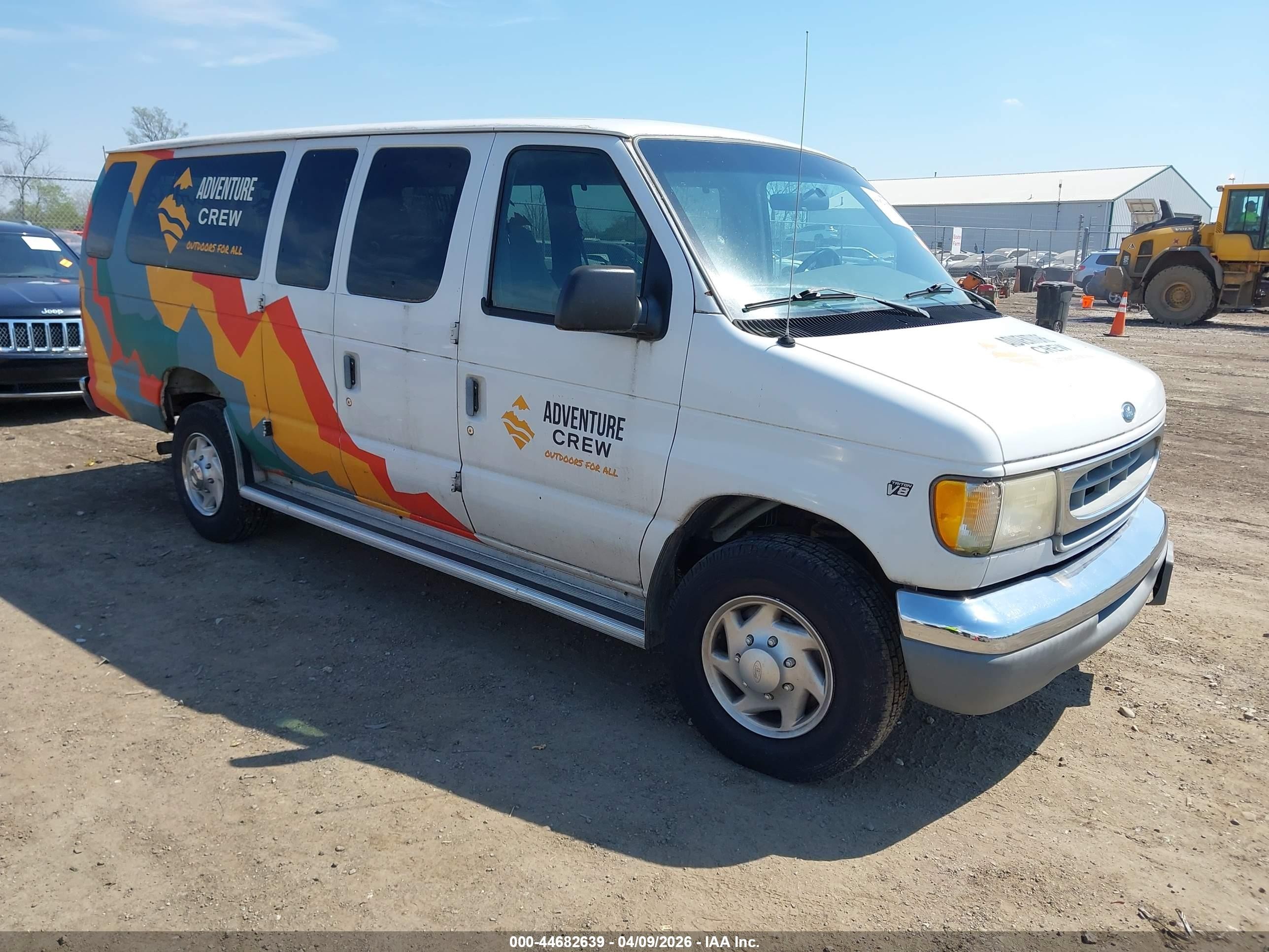 1998 Ford Econoline Wagon XL, VIN 1FBSS31L3WHB67643 — Normal wear