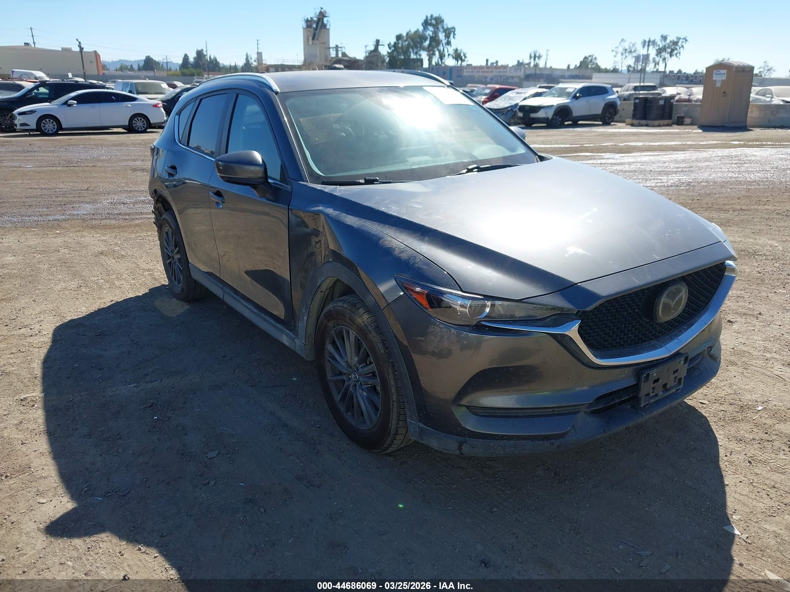 2021 Mazda CX-5 Touring, VIN JM3KFACM0M0323845 — Rear end