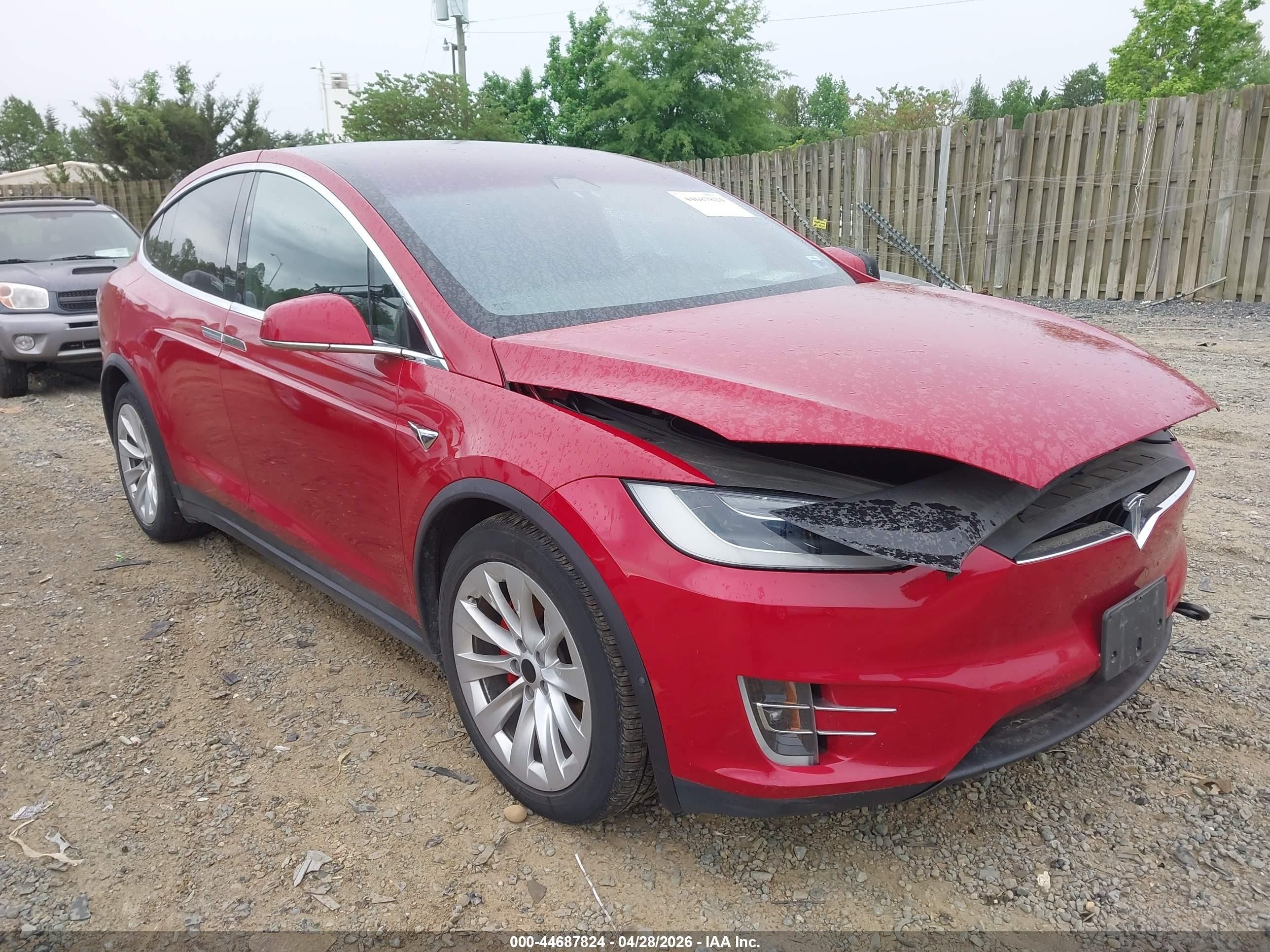 2019 Tesla Model X P100D, VIN 5YJXCDE44KF180418 — Side