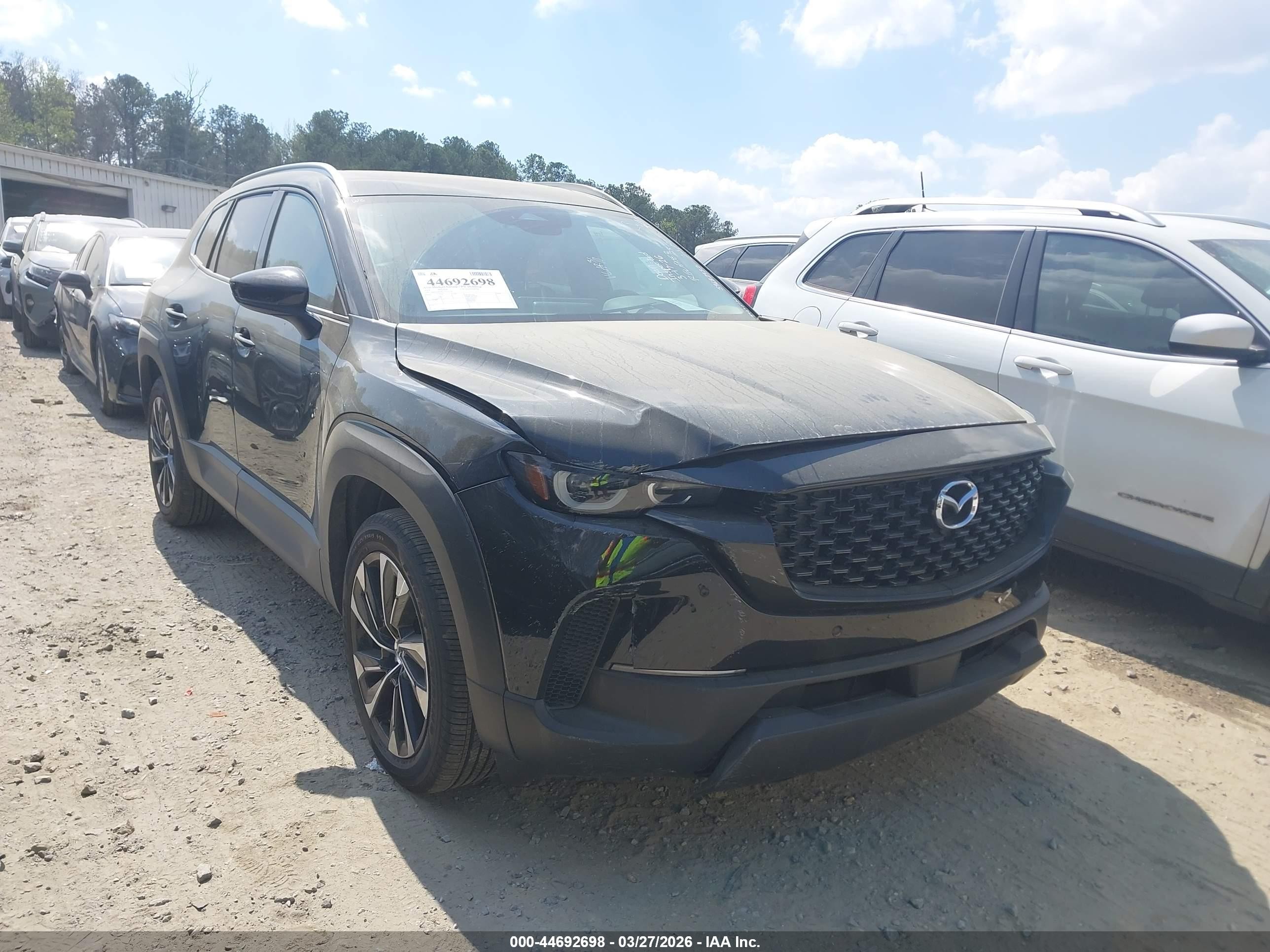 2026 Mazda CX-50 Hybrid Premium Plus, VIN 7MMVAAEW1TN151216 — Side