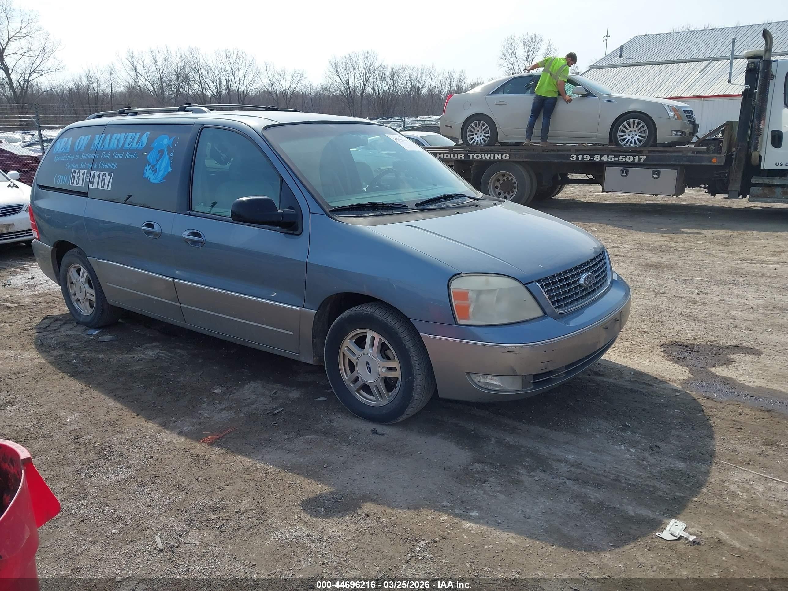 2005 Ford Freestar Limited, VIN 2FMDA58215BA69847 — Side