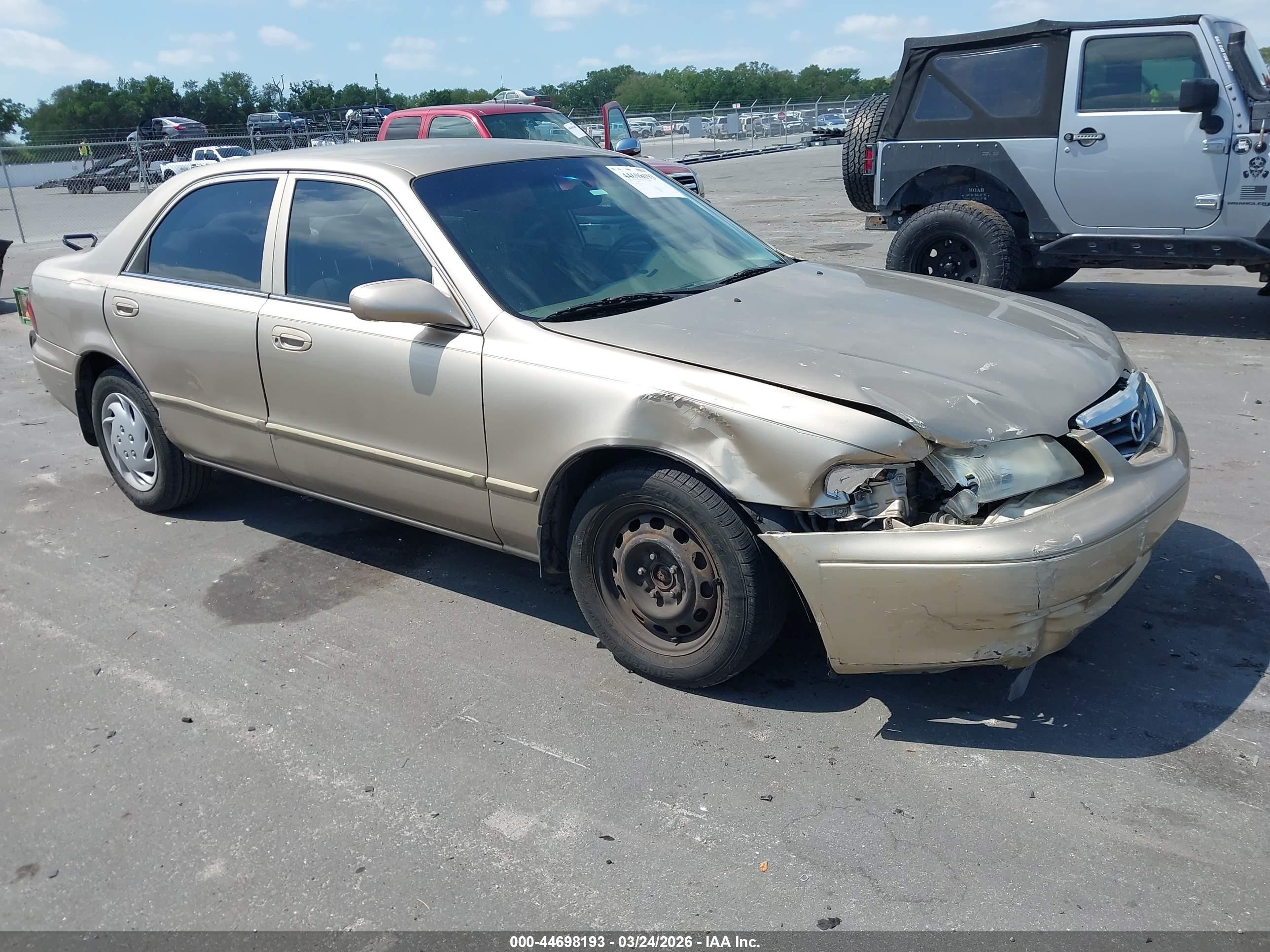 2000 Mazda 626 LX, VIN 1YVGF22D9Y5141425 — Front end