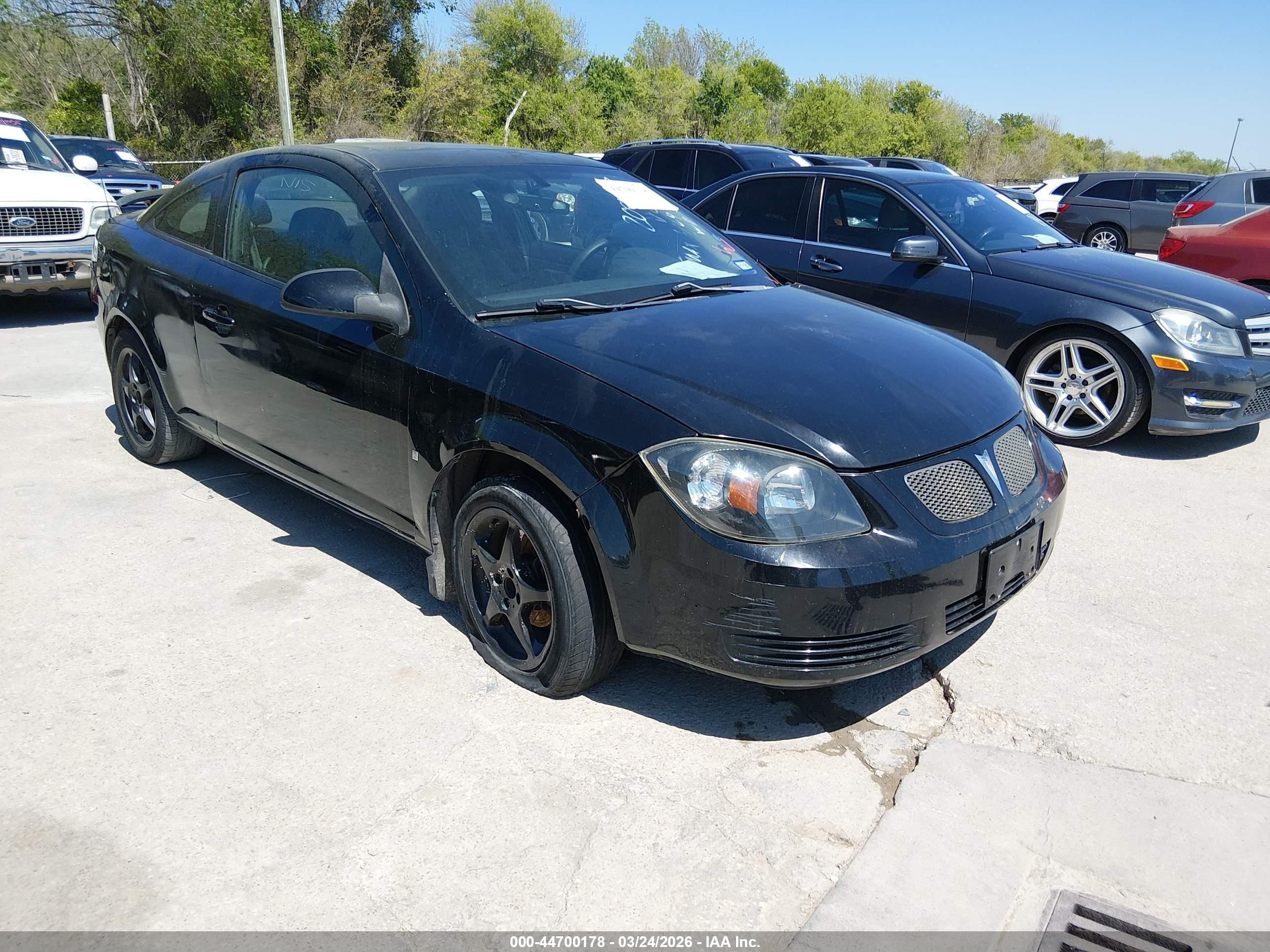 2009 Pontiac G5, VIN 1G2AS18H797209873 — Side