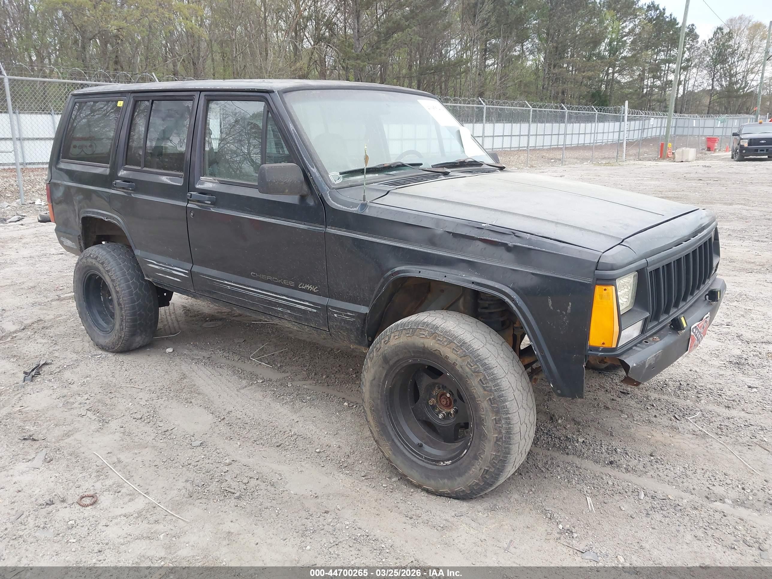 1996 Jeep Cherokee Sport, VIN 1J4FT68S3TL325023 — Side
