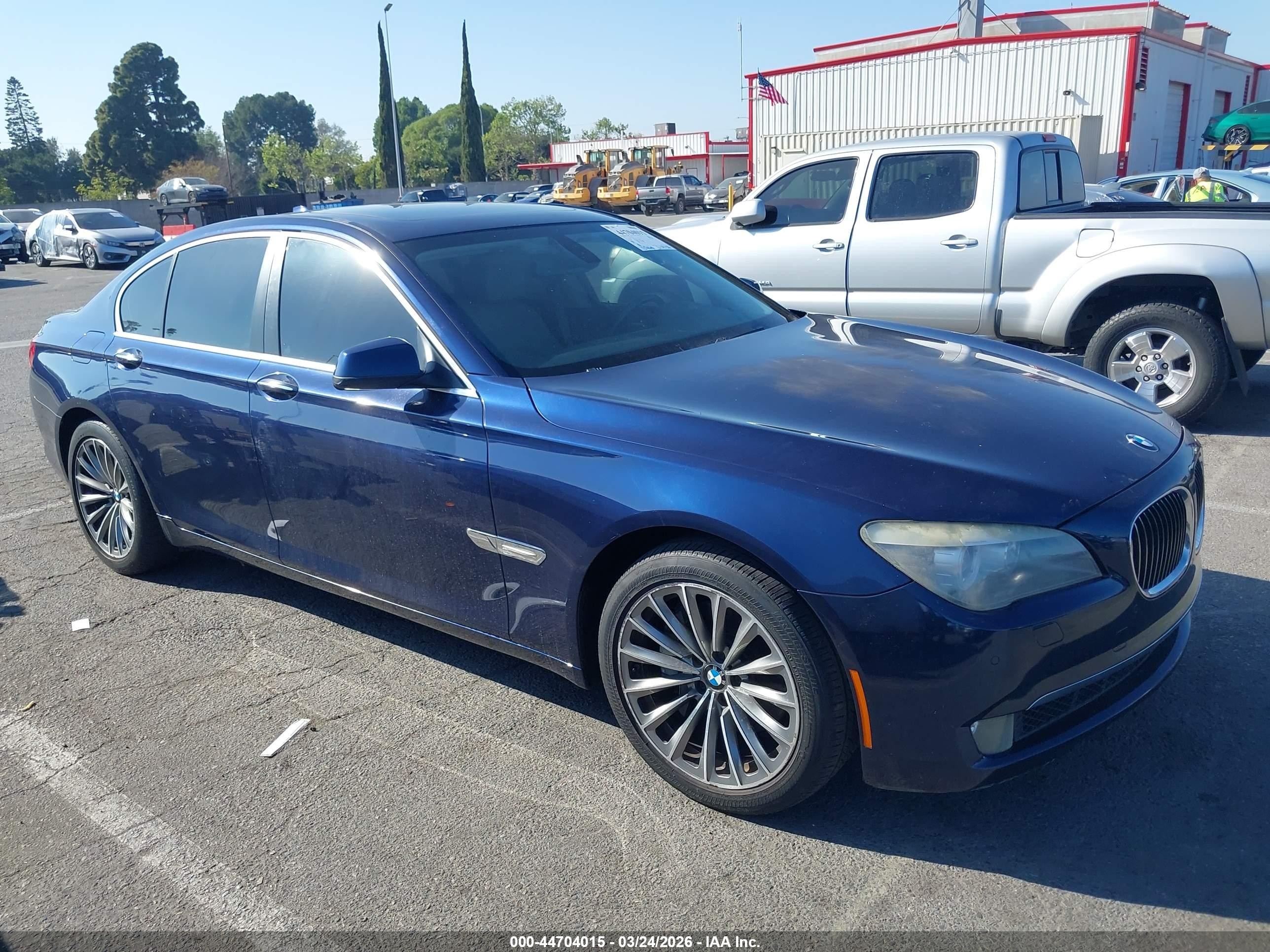 2011 BMW 7 Series 740i, VIN WBAKA4C53BC613233 — Normal wear