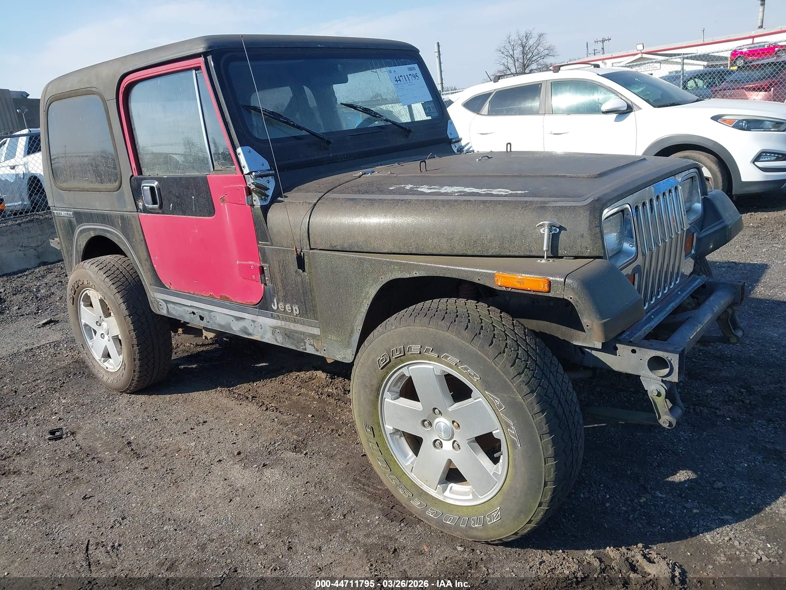 1989 Jeep Wrangler, VIN 2J4FY59T4KJ148473 — Front end