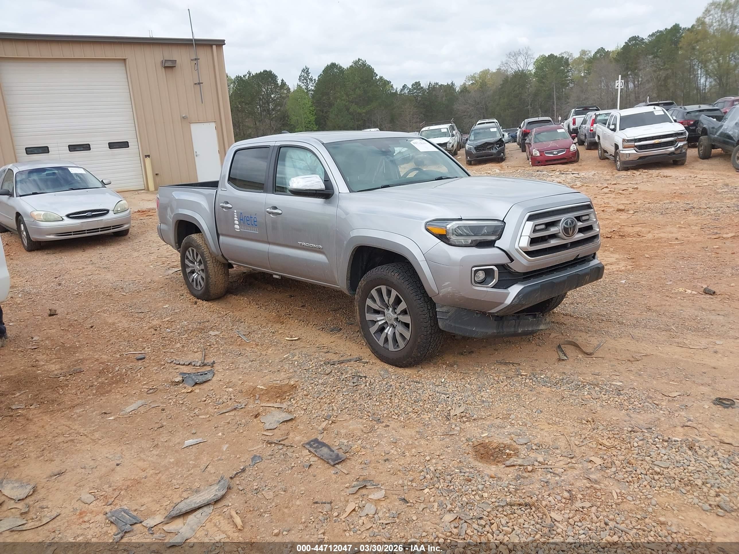 2021 Toyota Tacoma Limited, VIN 3TYGZ5AN0MT016539 — Side