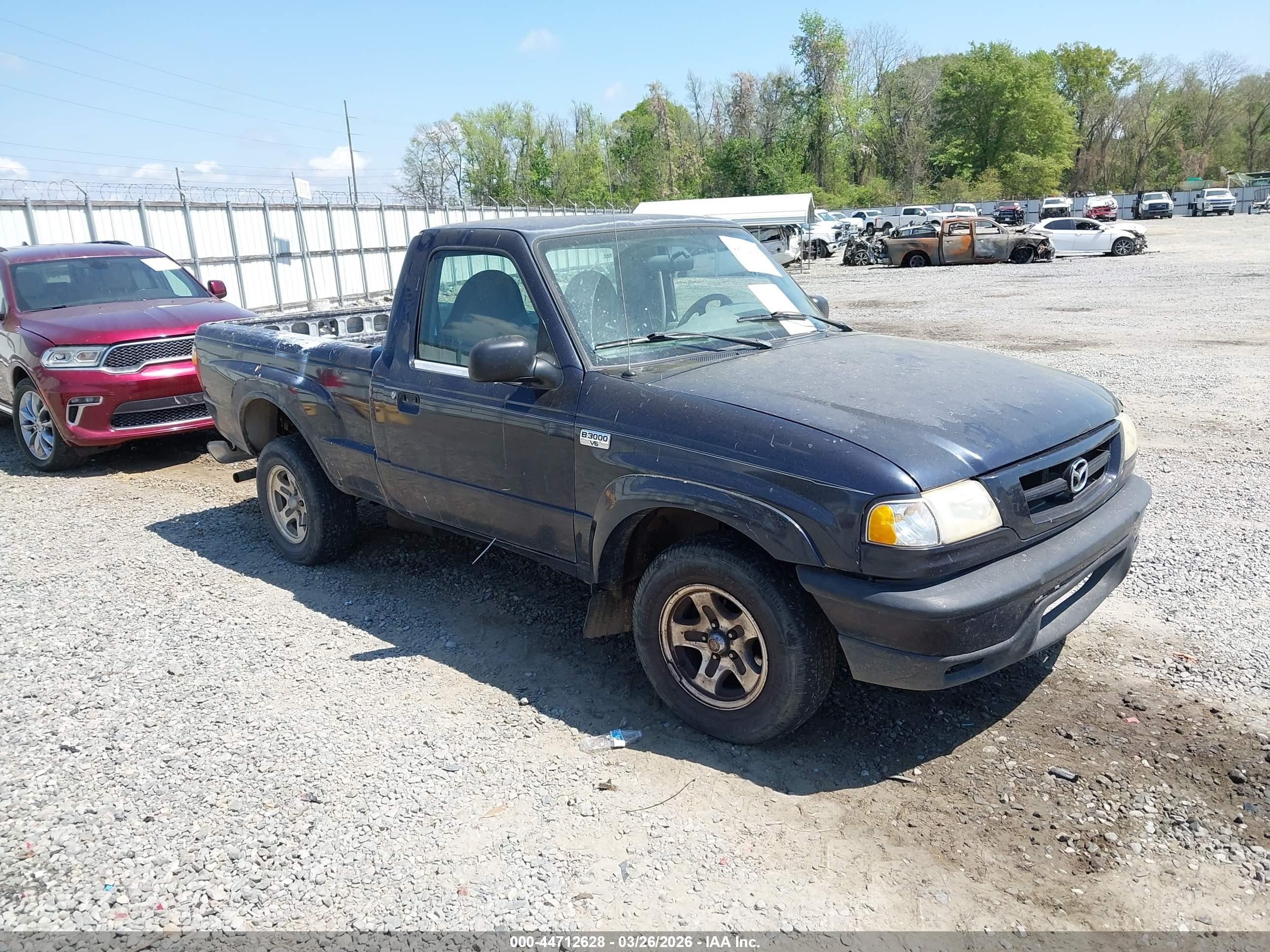 2001 Mazda B-Series DS, VIN 4F4YR12U51TM08838 — Зад
