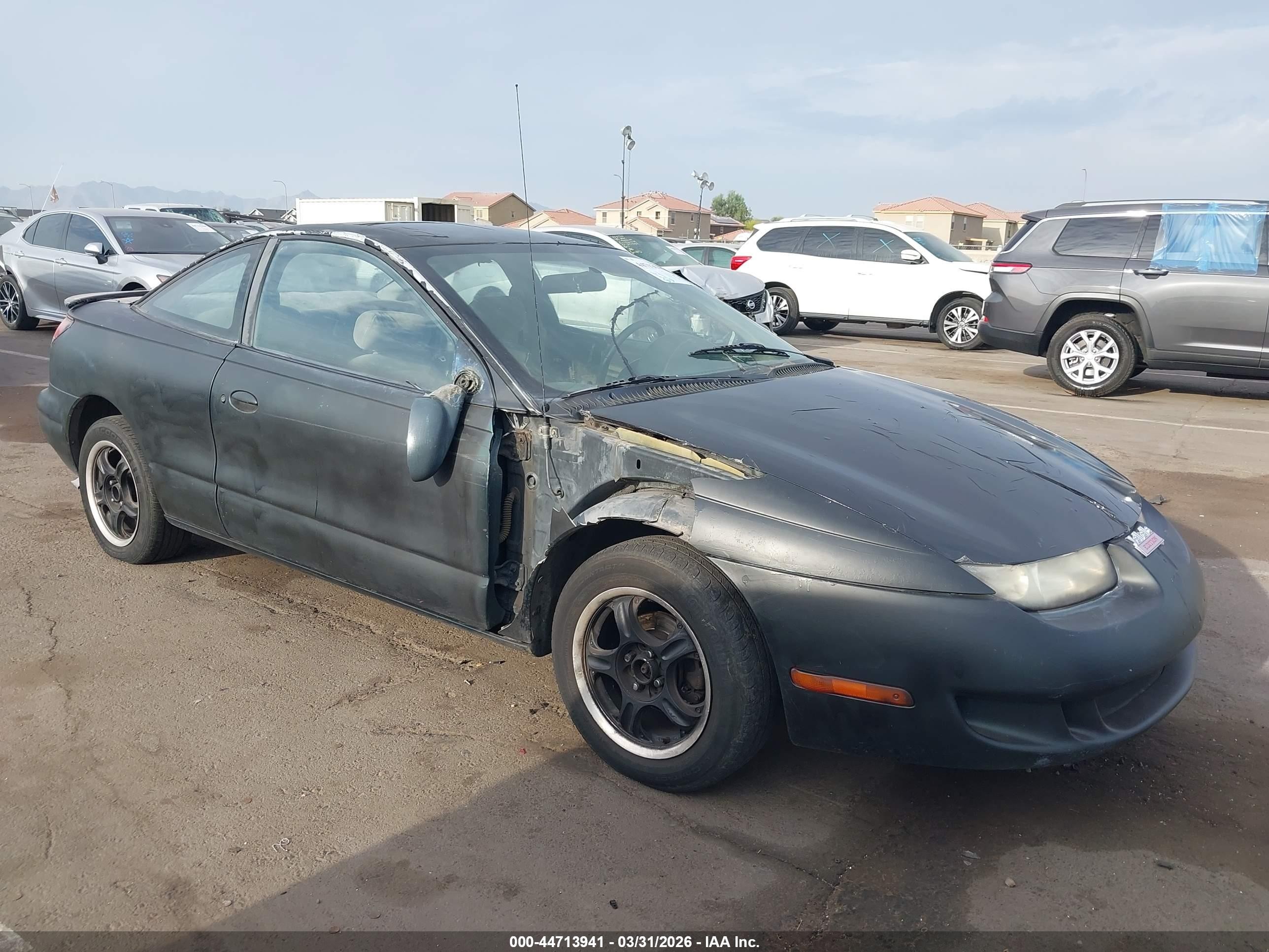 1997 Saturn SC, VIN 1G8ZH127XVZ250939 — Rear end